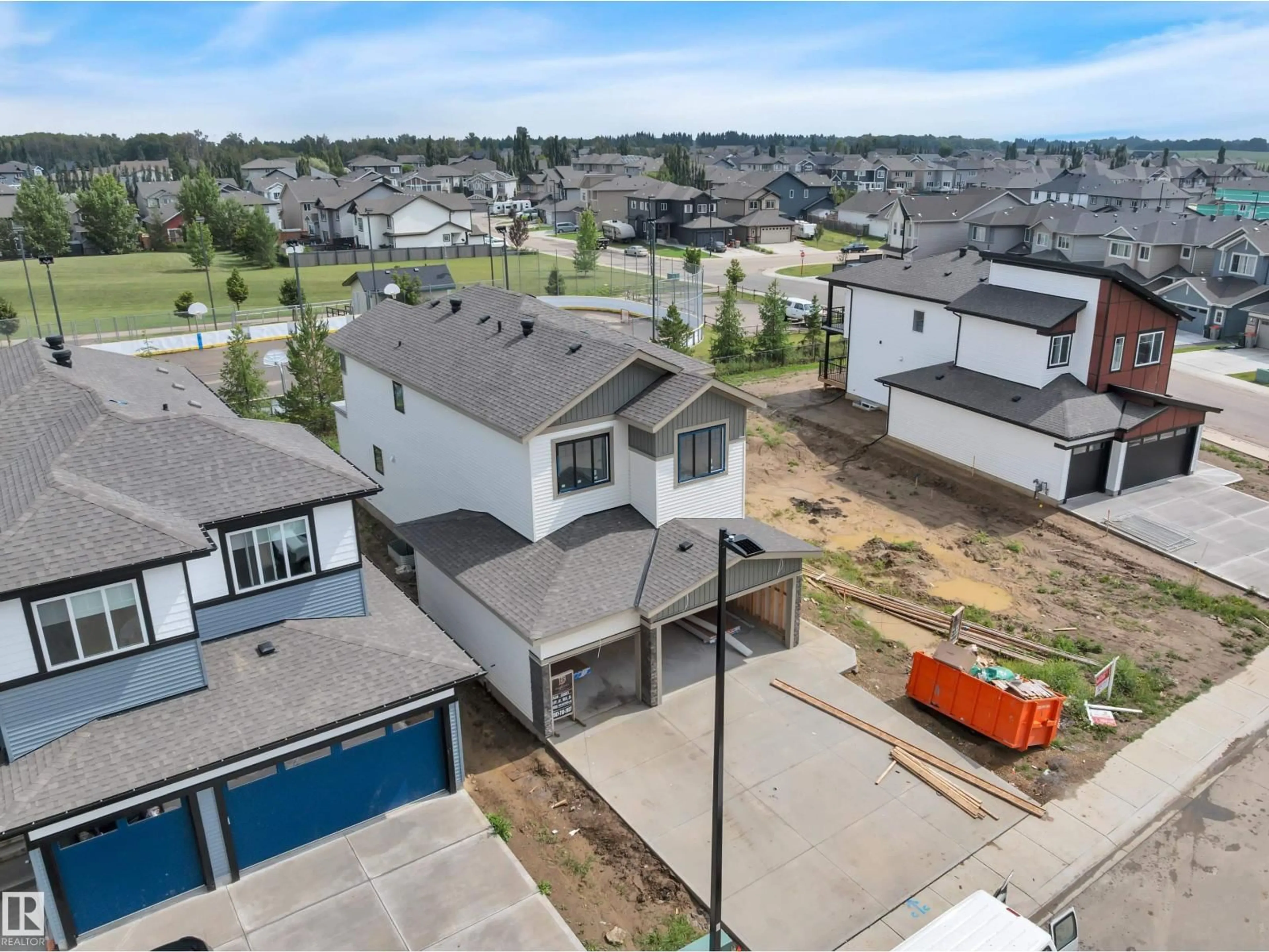 A pic from outside/outdoor area/front of a property/back of a property/a pic from drone, street for 1925 WESTERRA LN, Stony Plain Alberta T7Z0L3