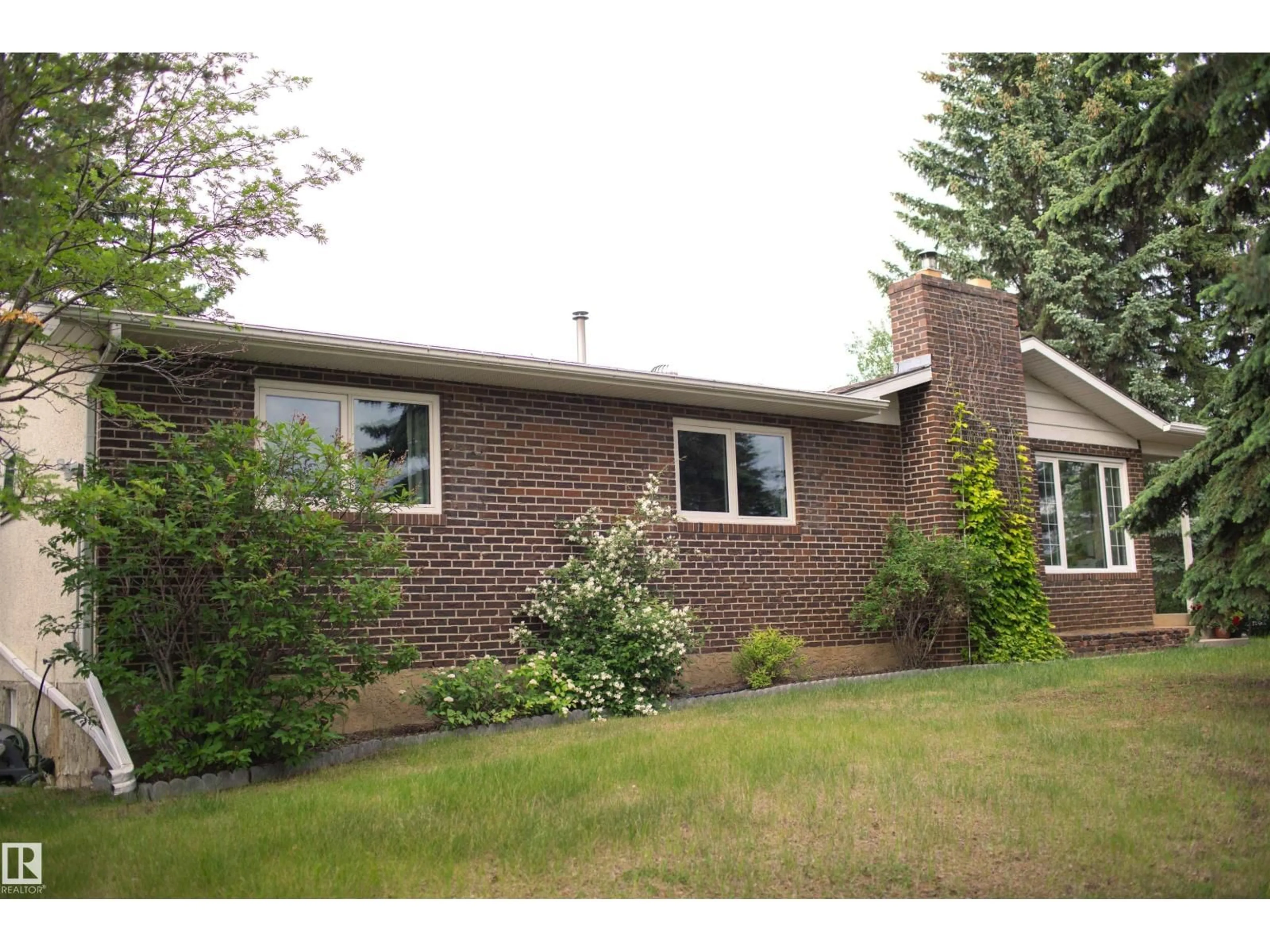 Home with brick exterior material, street for 37 - 55305 RGE ROAD 242, Rural Sturgeon County Alberta T8T1Y1