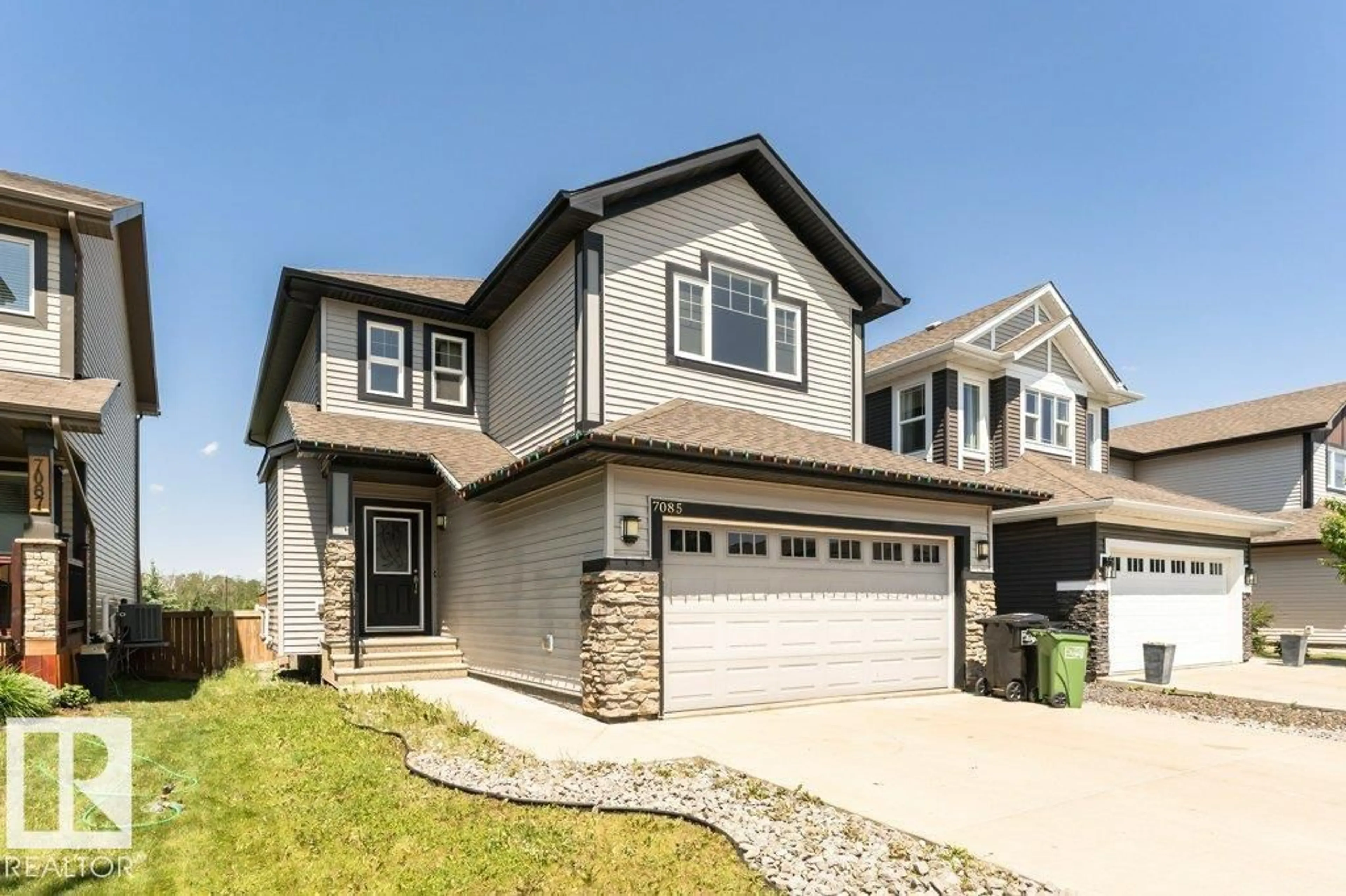 Home with vinyl exterior material, street for SW - 7085 ARMOUR BN, Edmonton Alberta T6W2N9