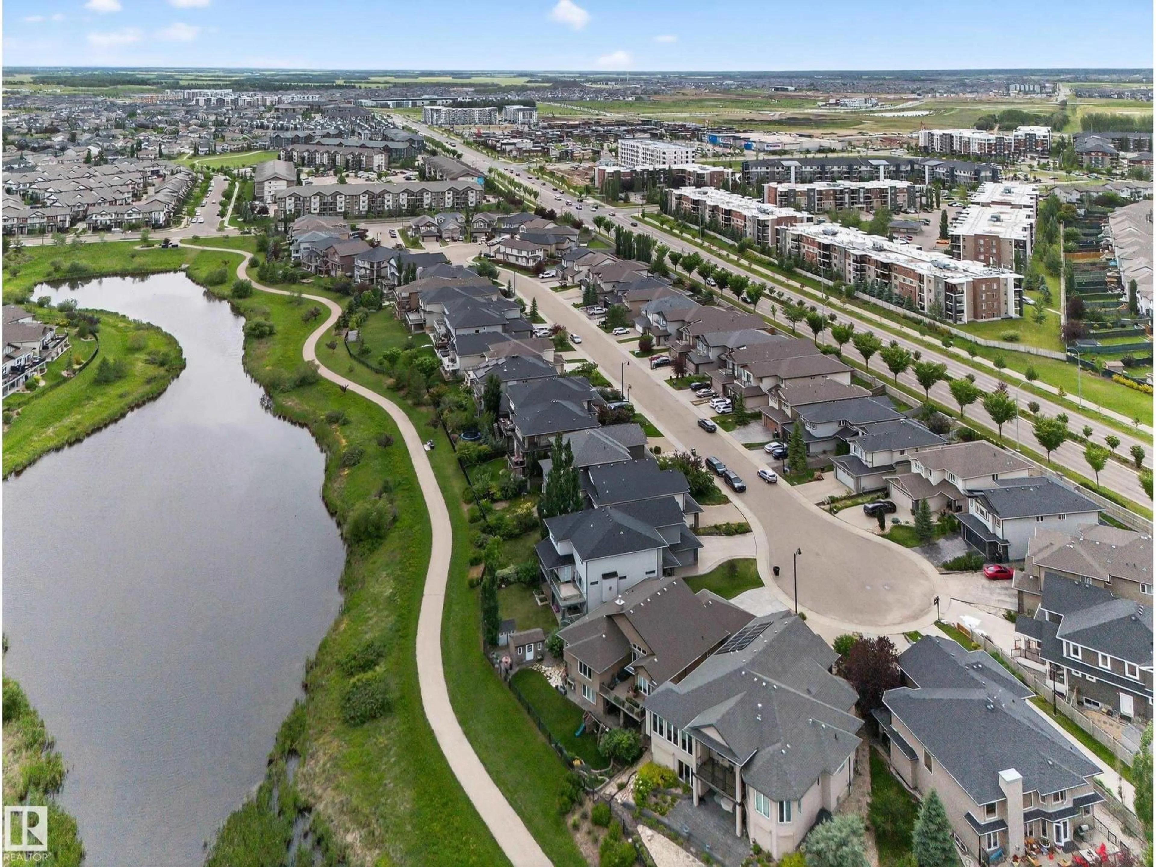 A pic from outside/outdoor area/front of a property/back of a property/a pic from drone, water/lake/river/ocean view for CA SW - 1552 CUNNINGHAM CAPE, Edmonton Alberta T6W0Y3