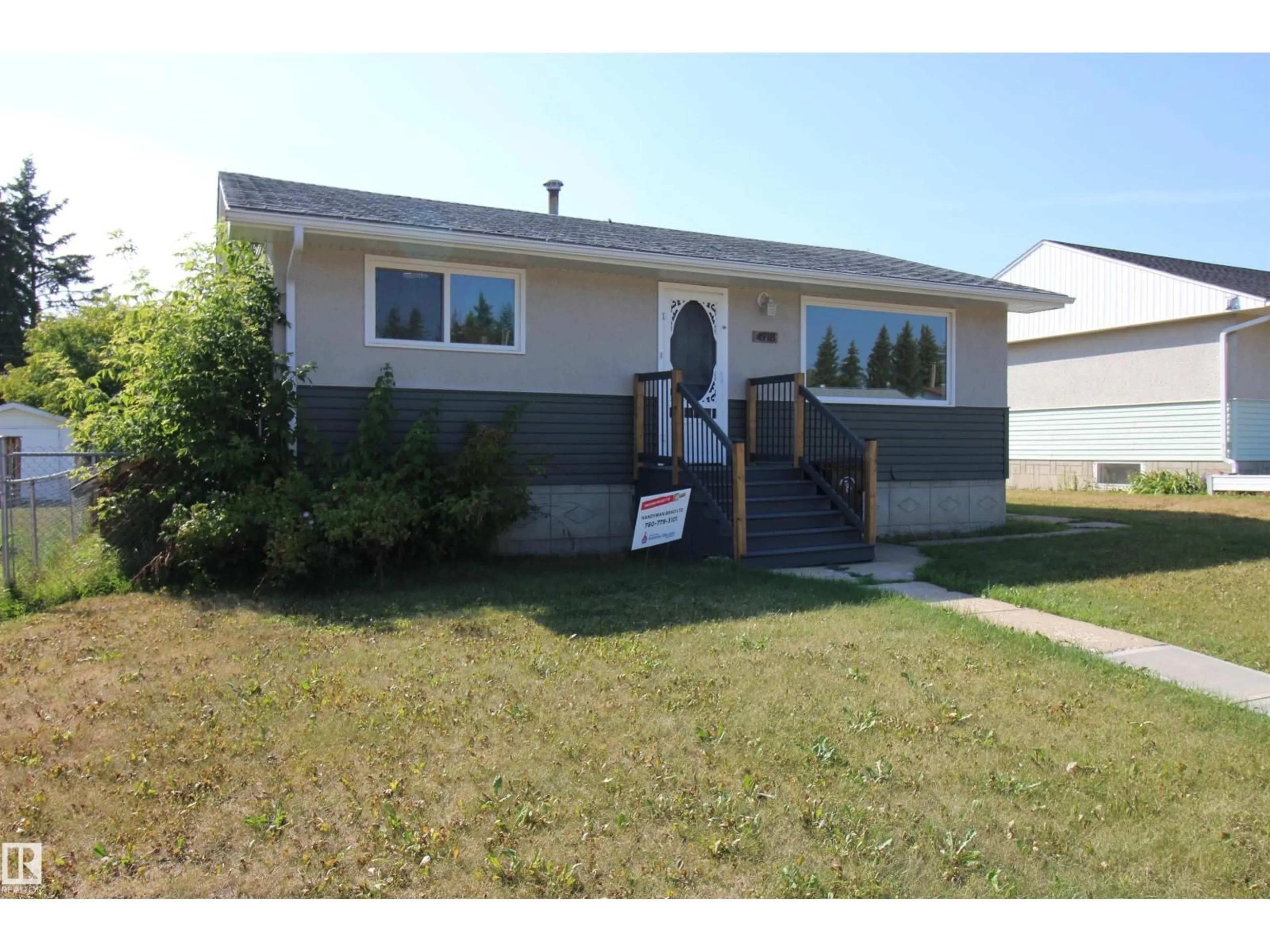 Home with vinyl exterior material, street for 4918 46A ST, Barrhead Alberta T7N1H6