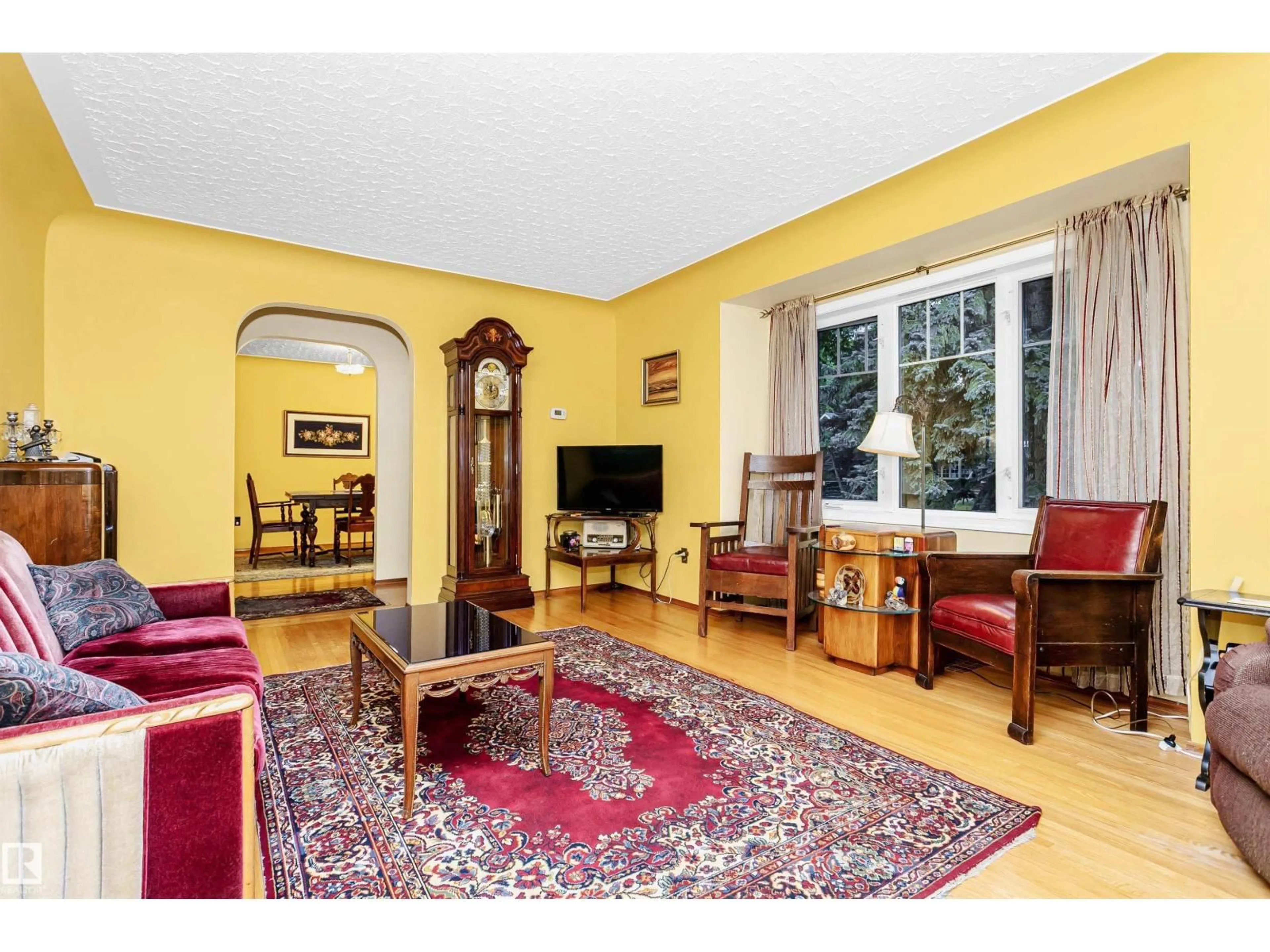 Living room with furniture, unknown for 11216 70 AV, Edmonton Alberta T6H2H1