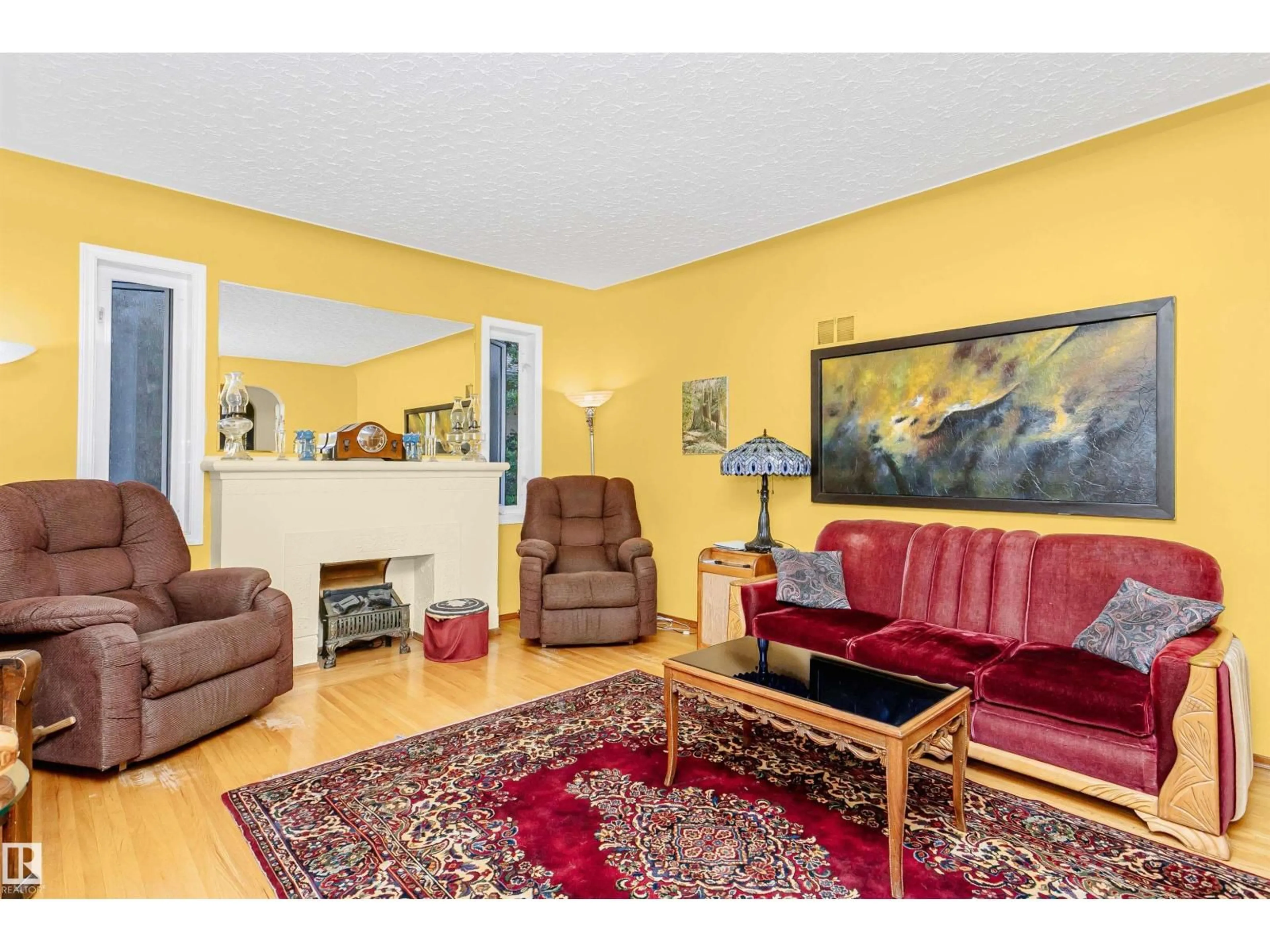 Living room with furniture, unknown for 11216 70 AV, Edmonton Alberta T6H2H1