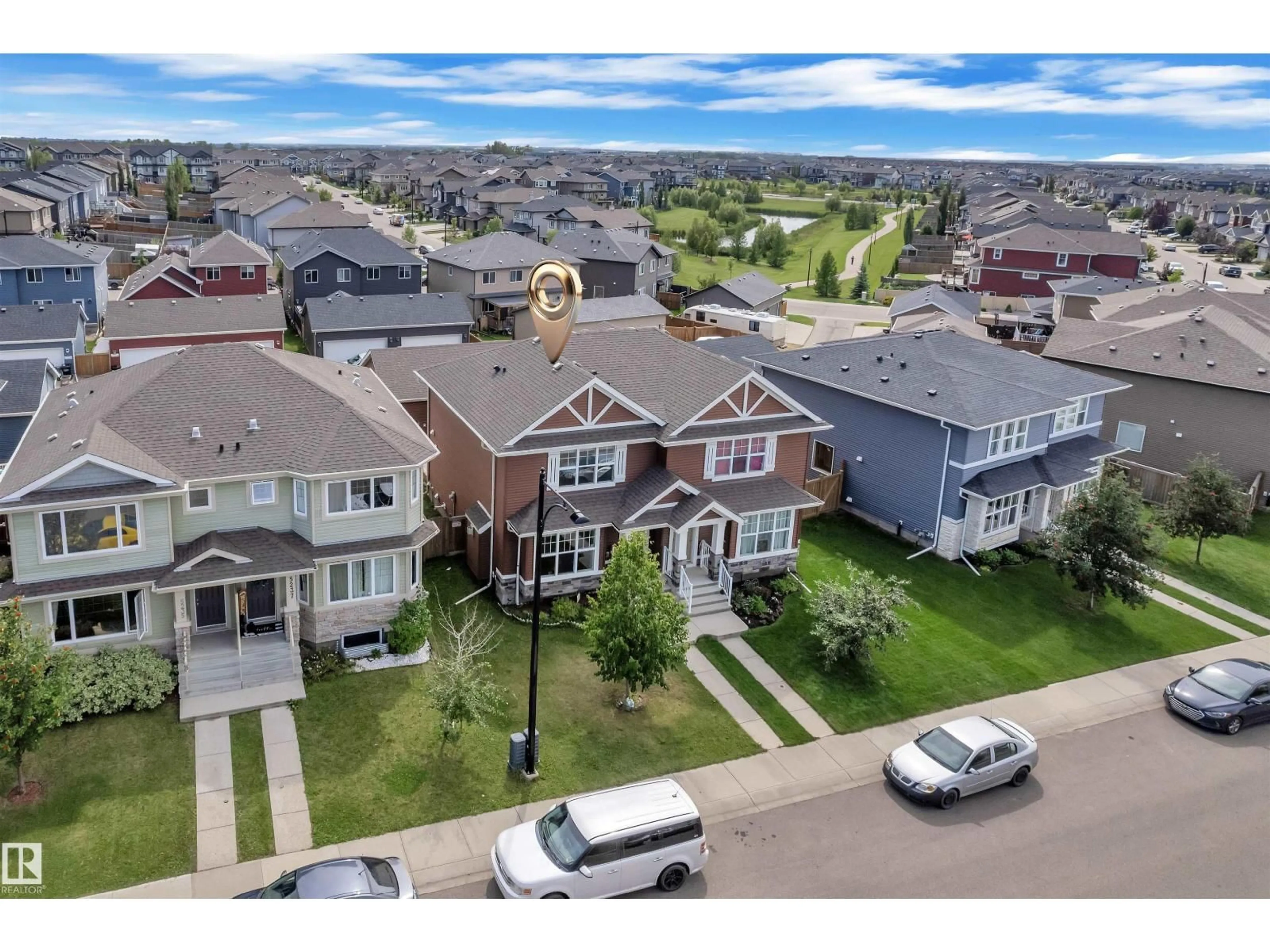 A pic from outside/outdoor area/front of a property/back of a property/a pic from drone, street for 5239 20 AV, Edmonton Alberta T6X1V5