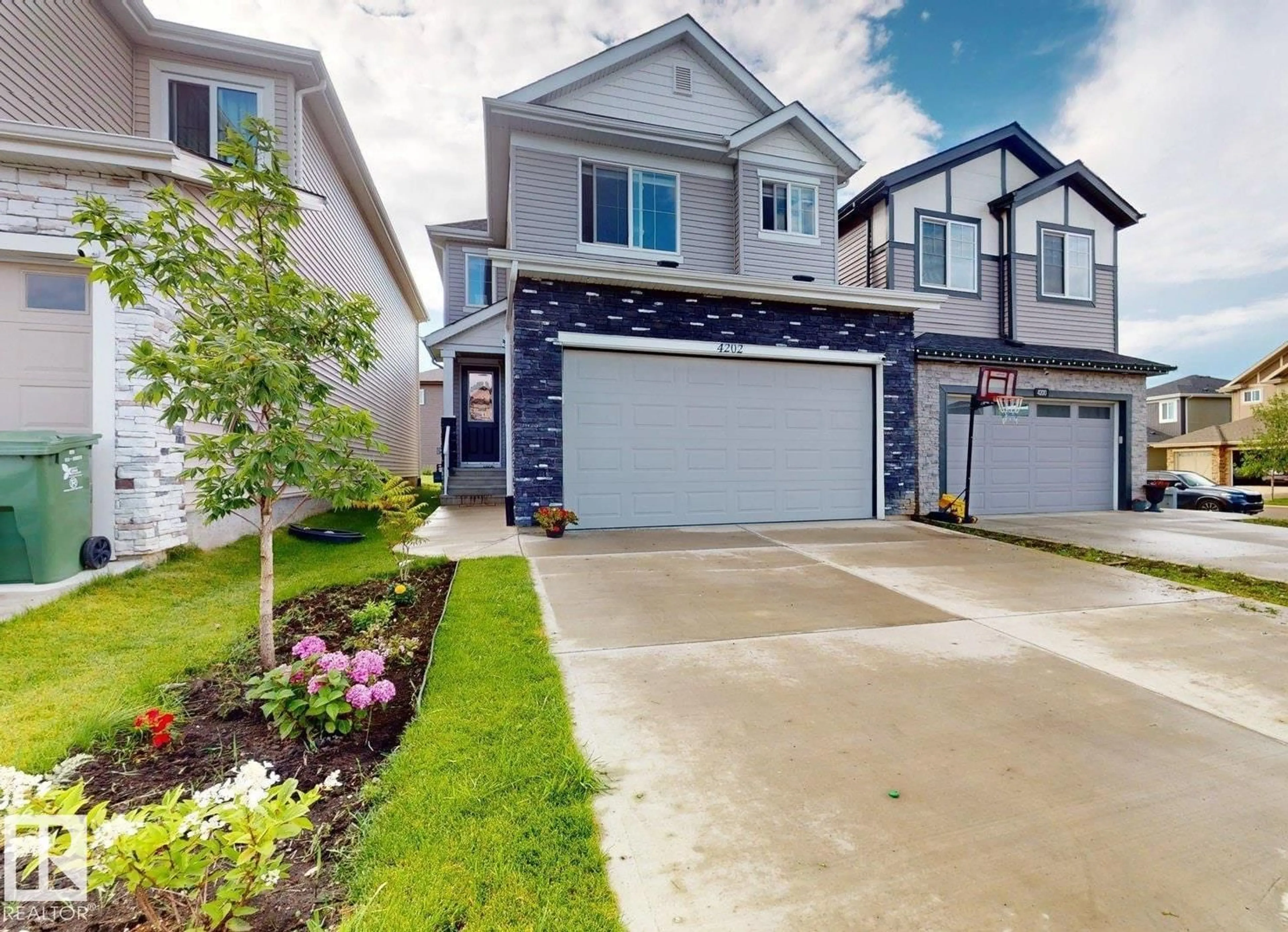 A pic from outside/outdoor area/front of a property/back of a property/a pic from drone, street for 4202 38A ST, Beaumont Alberta T4X0C4