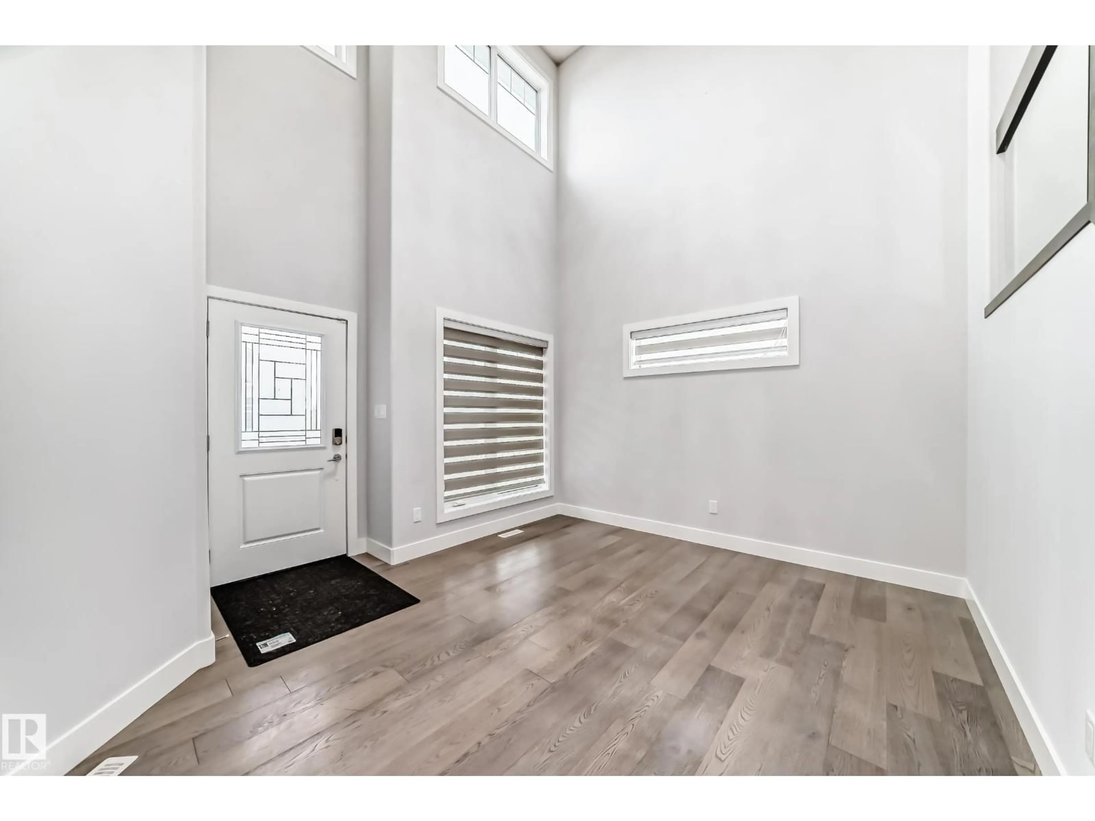 Indoor entryway for 6105 19A AV, Edmonton Alberta T6X2A5