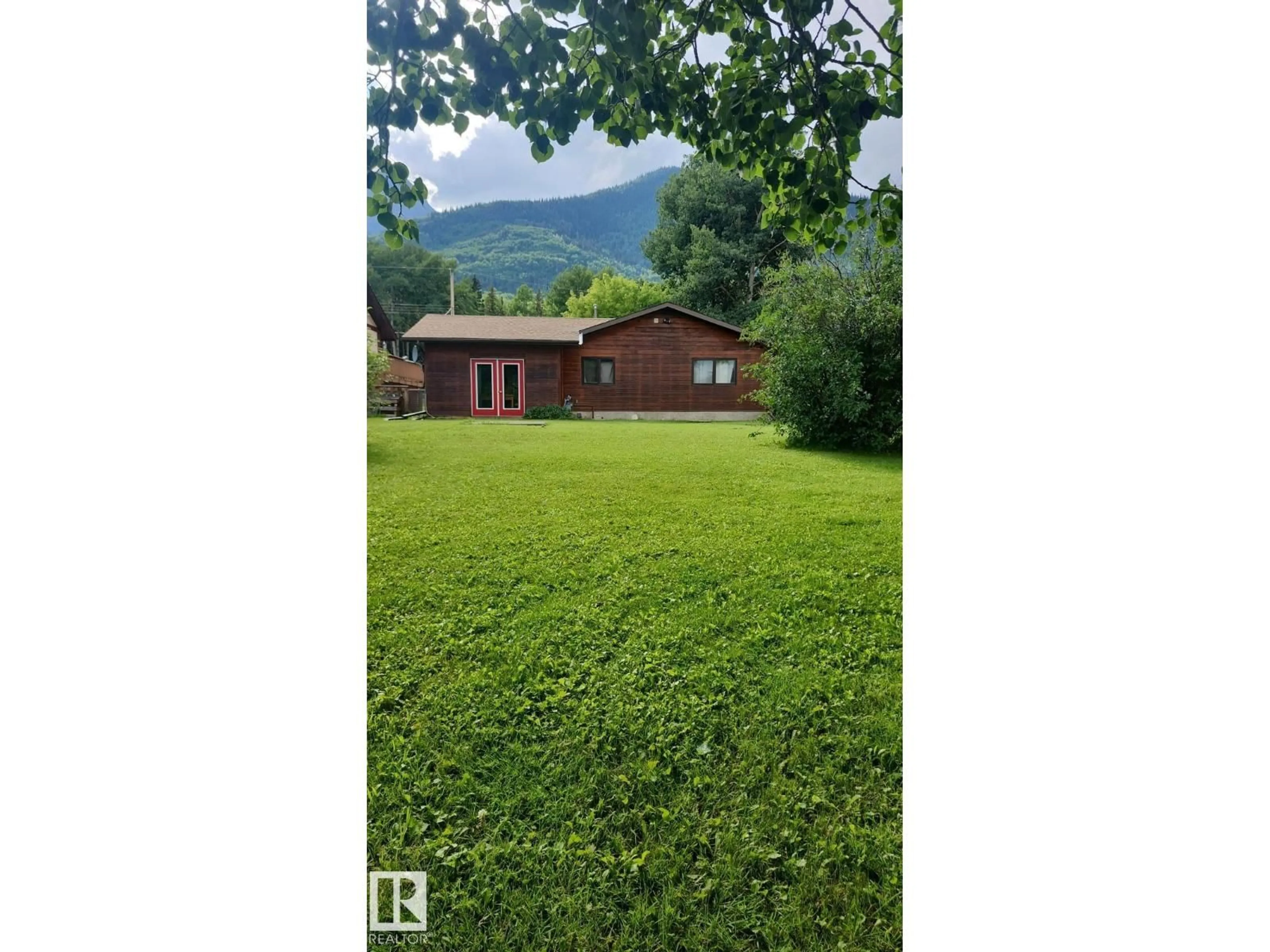 A pic from outside/outdoor area/front of a property/back of a property/a pic from drone, mountain view for 4921 CENTRE ST, Brule Alberta T0E0C0