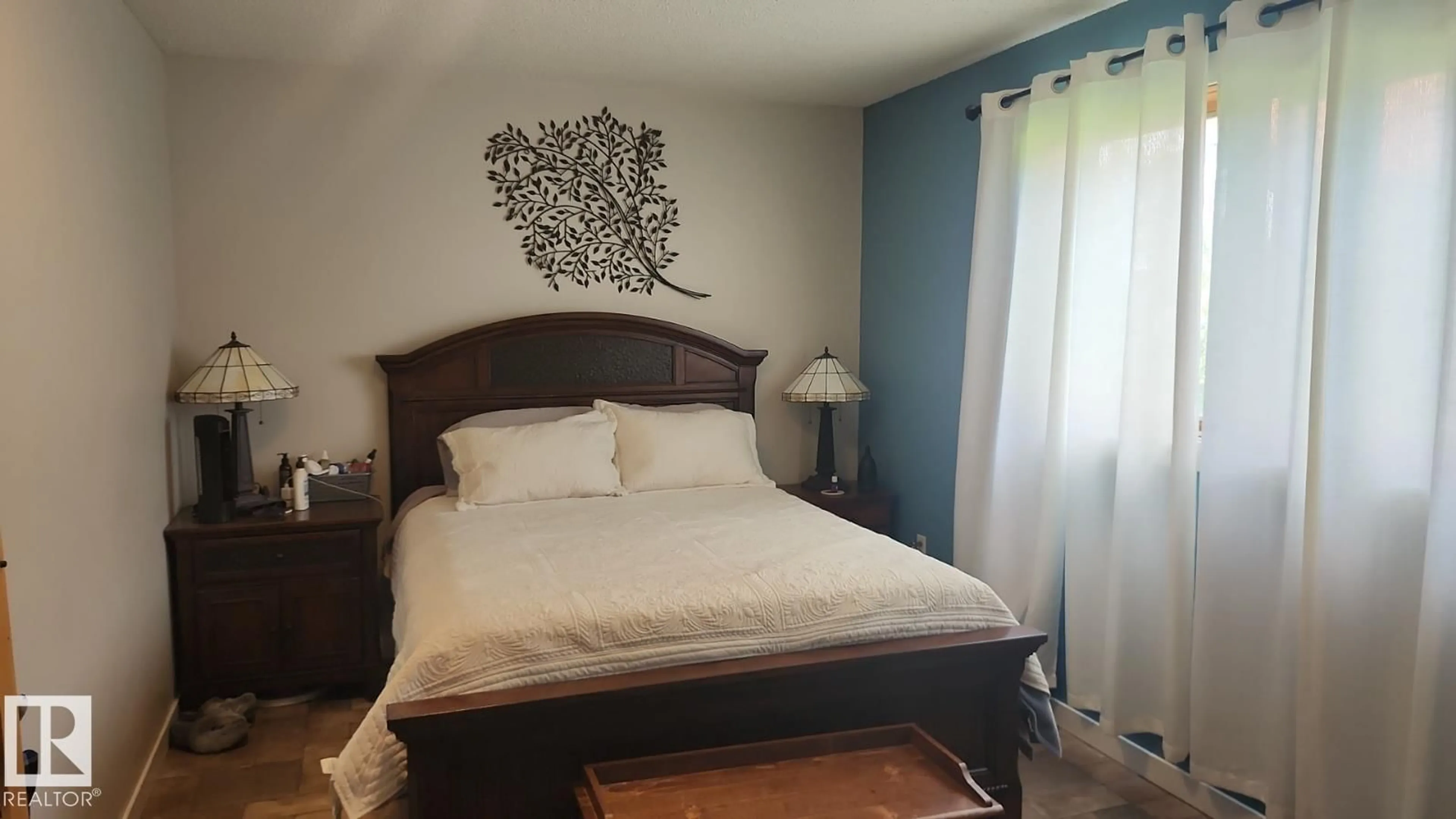 Bedroom with bed, wood/laminate floor for 4921 CENTRE ST, Brule Alberta T0E0C0