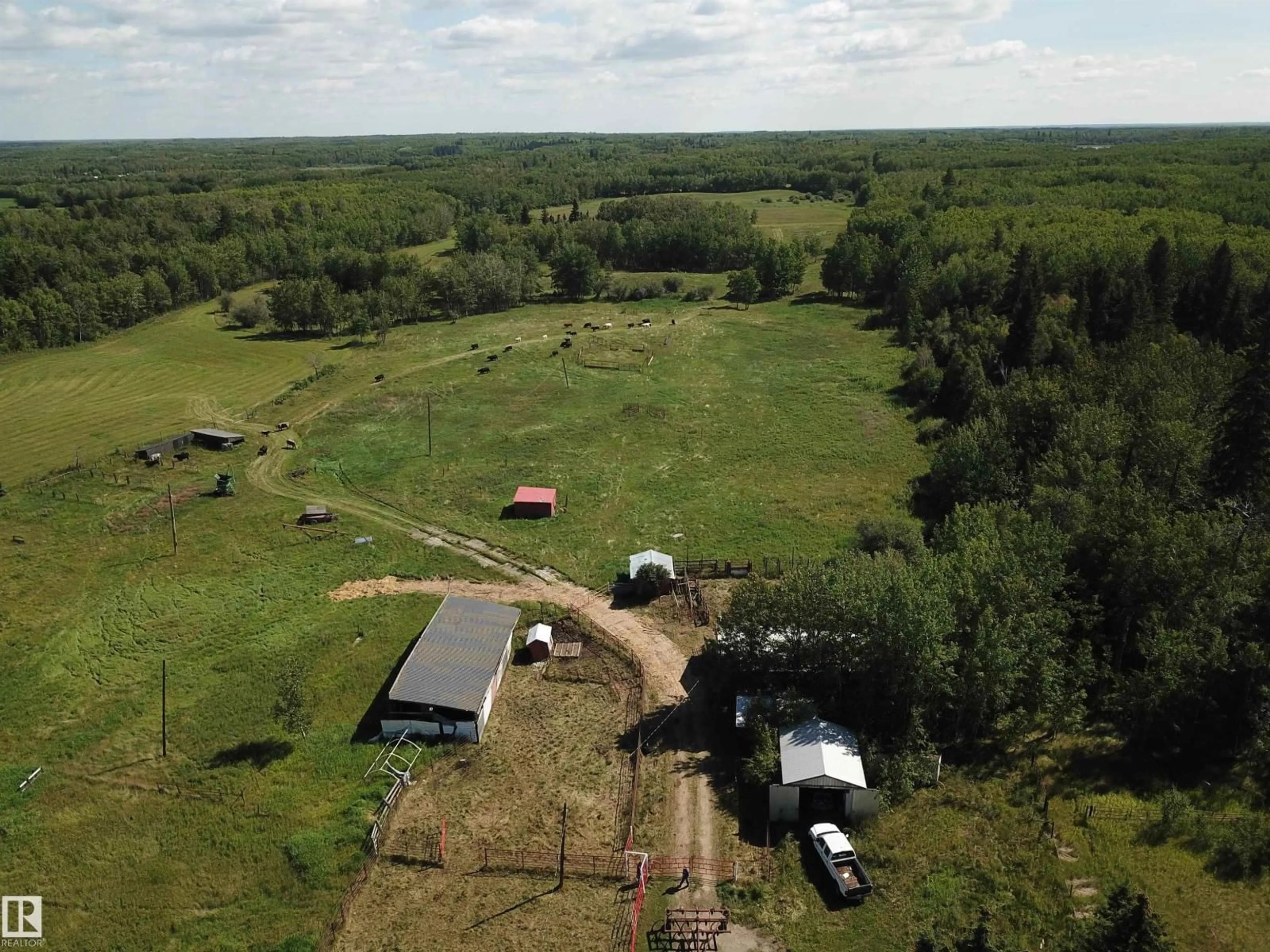 A pic from outside/outdoor area/front of a property/back of a property/a pic from drone, building for 53121 RG RD 212, Rural Strathcona County Alberta T8G1G1