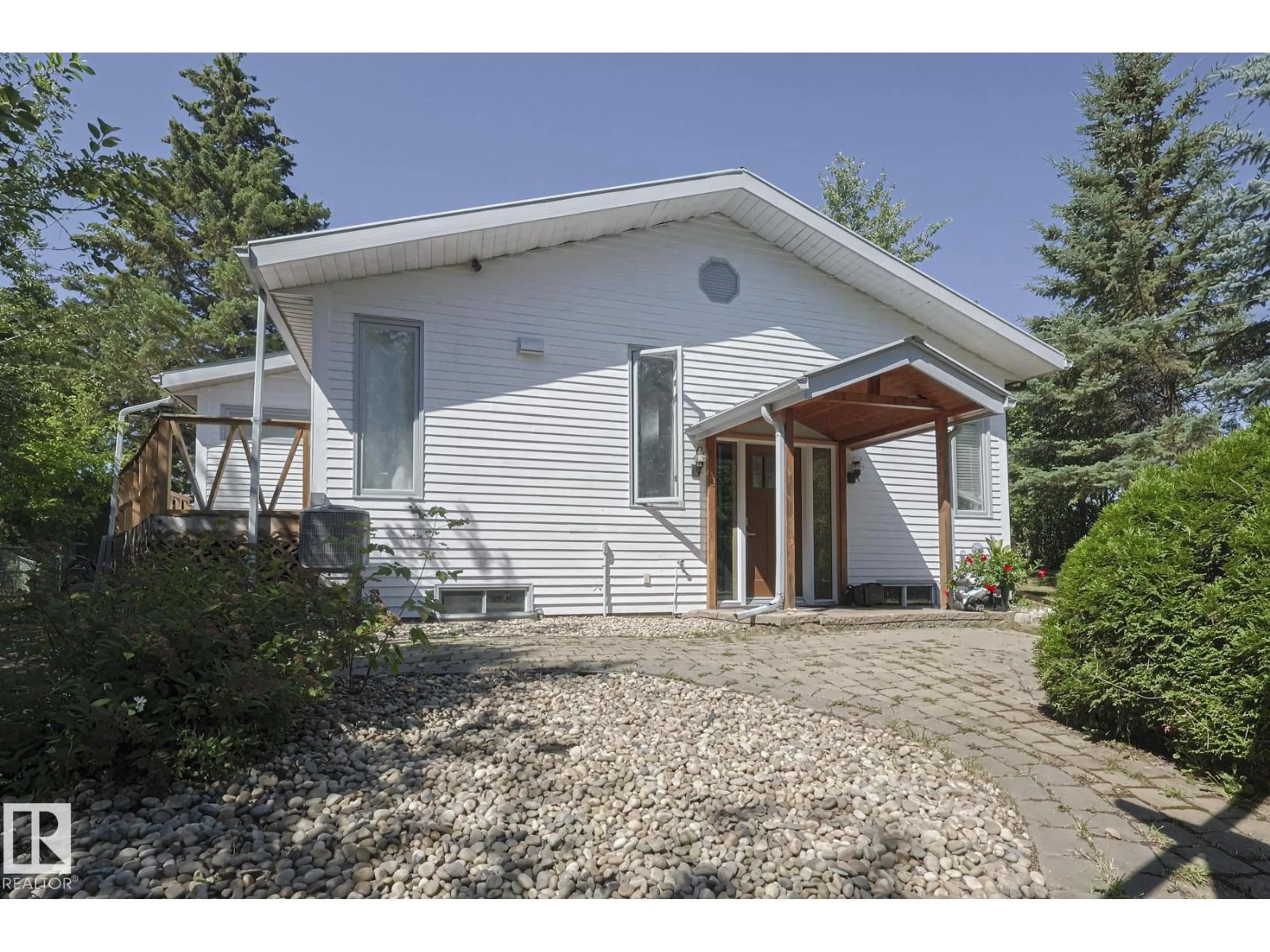 Home with vinyl exterior material, street for 9 GIBBONS AV, Rural Parkland County Alberta T0E2Y0
