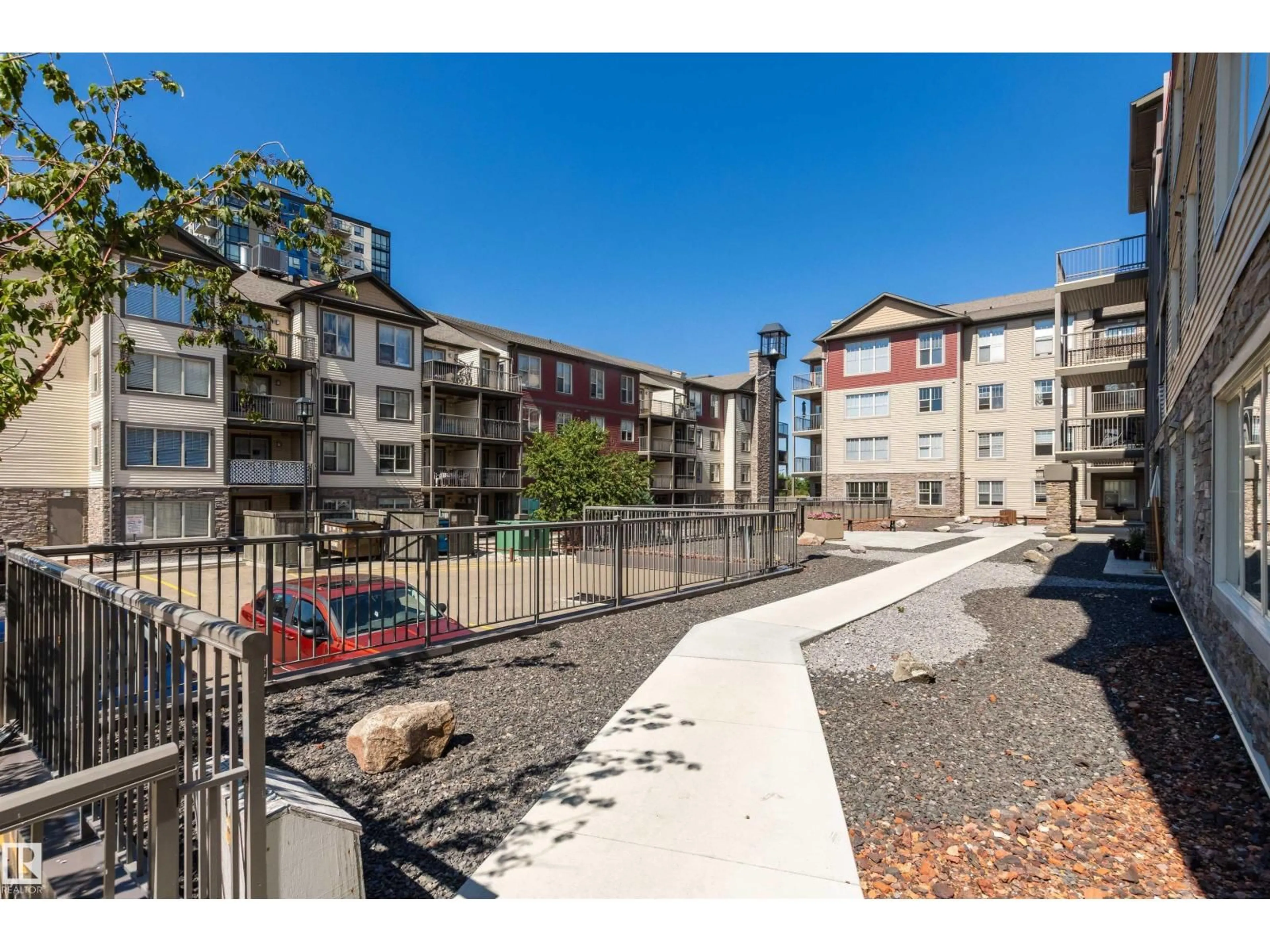 A pic from outside/outdoor area/front of a property/back of a property/a pic from drone, street for 105 - 313 AMBLESIDE DR, Edmonton Alberta T6W0J4
