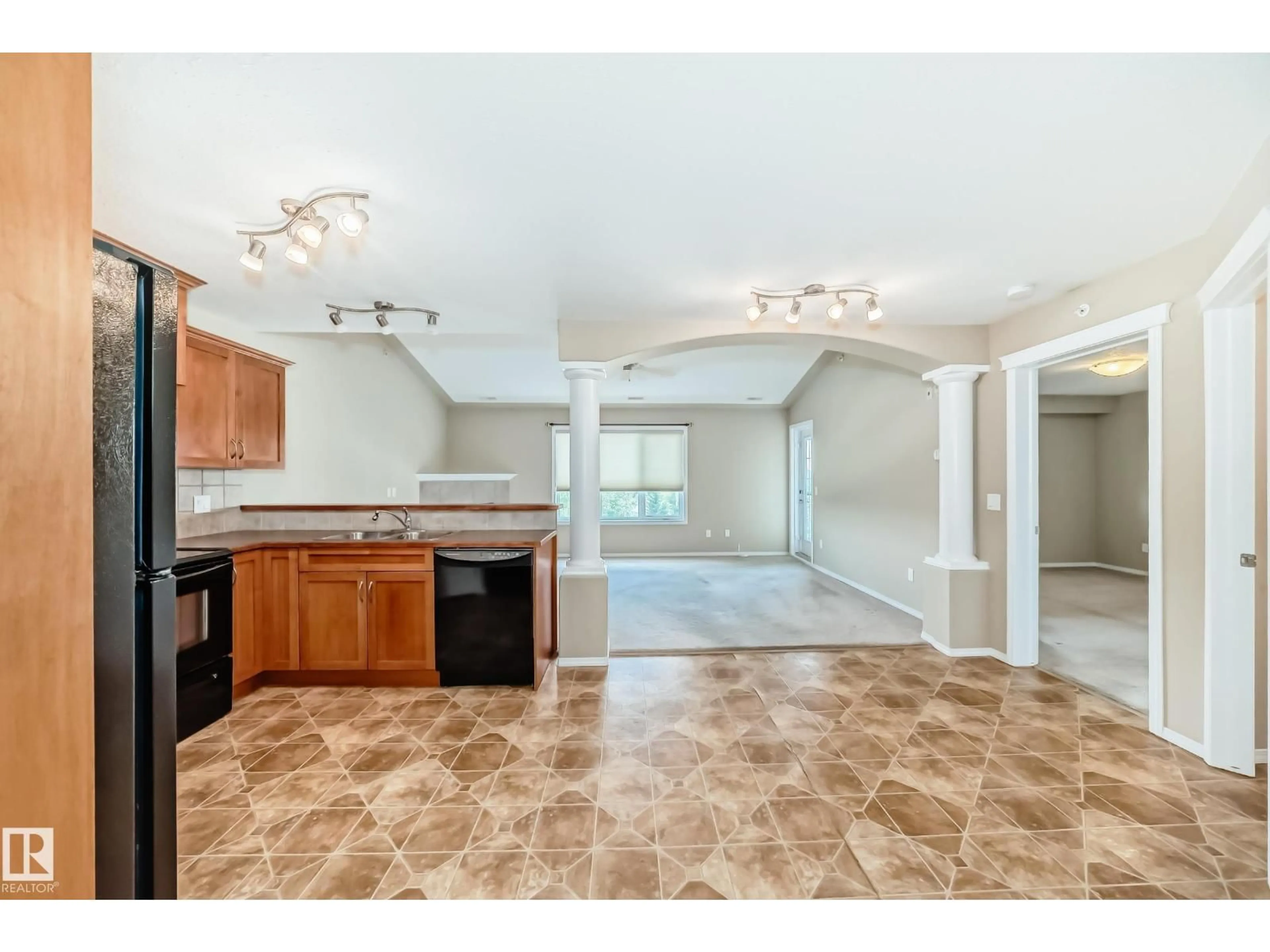 Open concept kitchen, ceramic/tile floor for #261 - 512 YOUVILLE DR, Edmonton Alberta T6L7H3