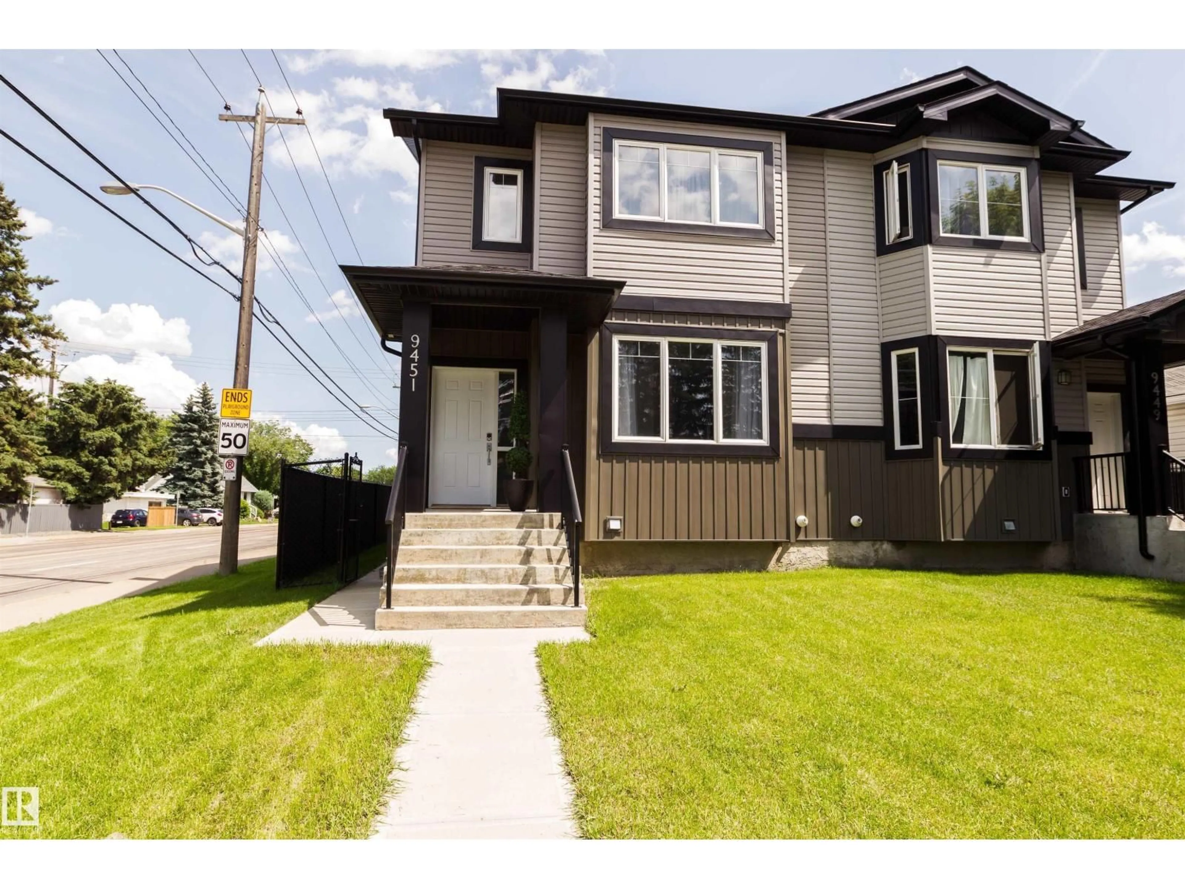 Home with vinyl exterior material, street for NW - 9449 152 ST, Edmonton Alberta T5R1N1