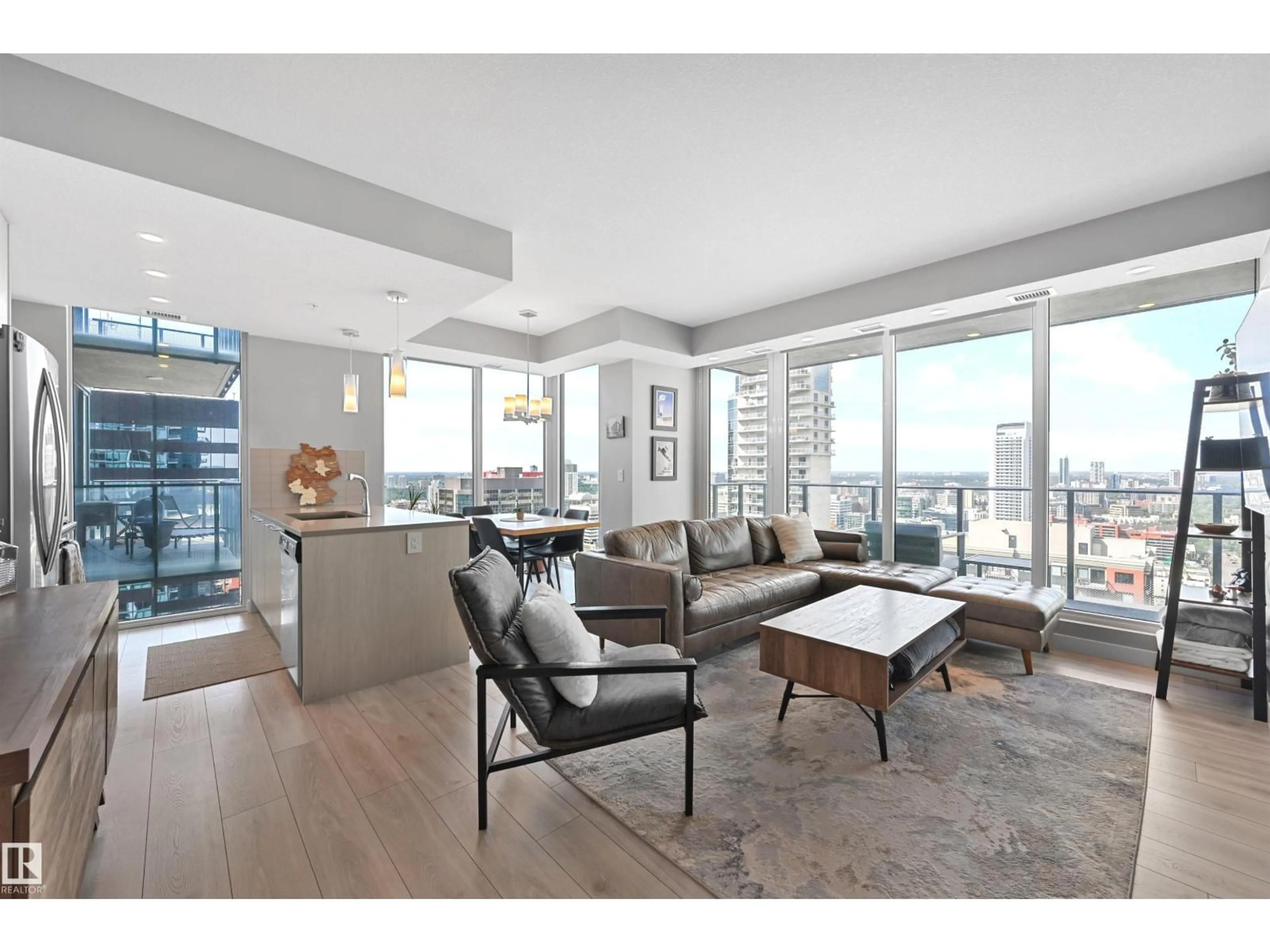 Living room with furniture, unknown for 2701 10180 103 ST NW, Edmonton Alberta T5J0L1