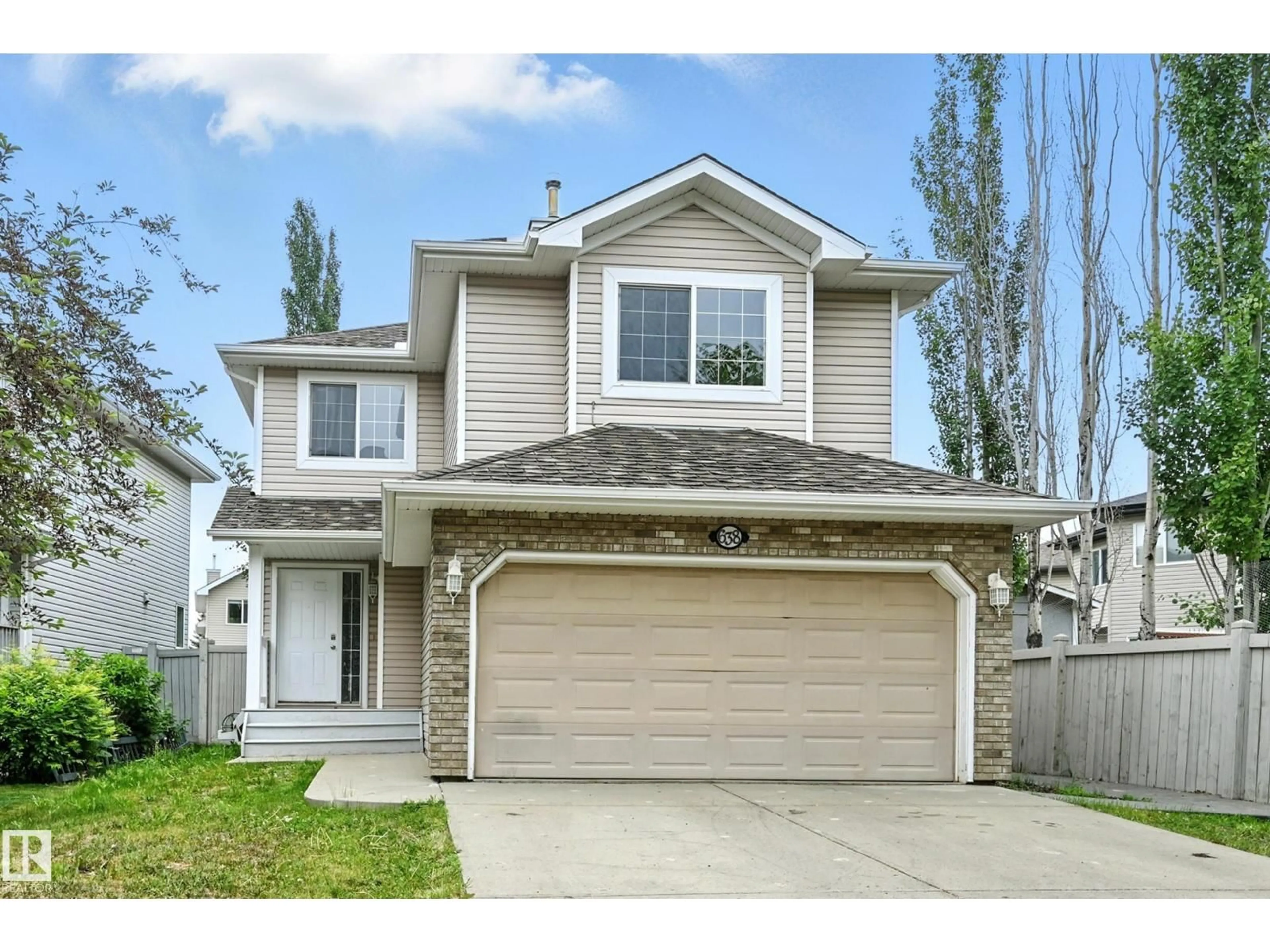Home with vinyl exterior material, street for 638 LEGER WY, Edmonton Alberta T6R0C1