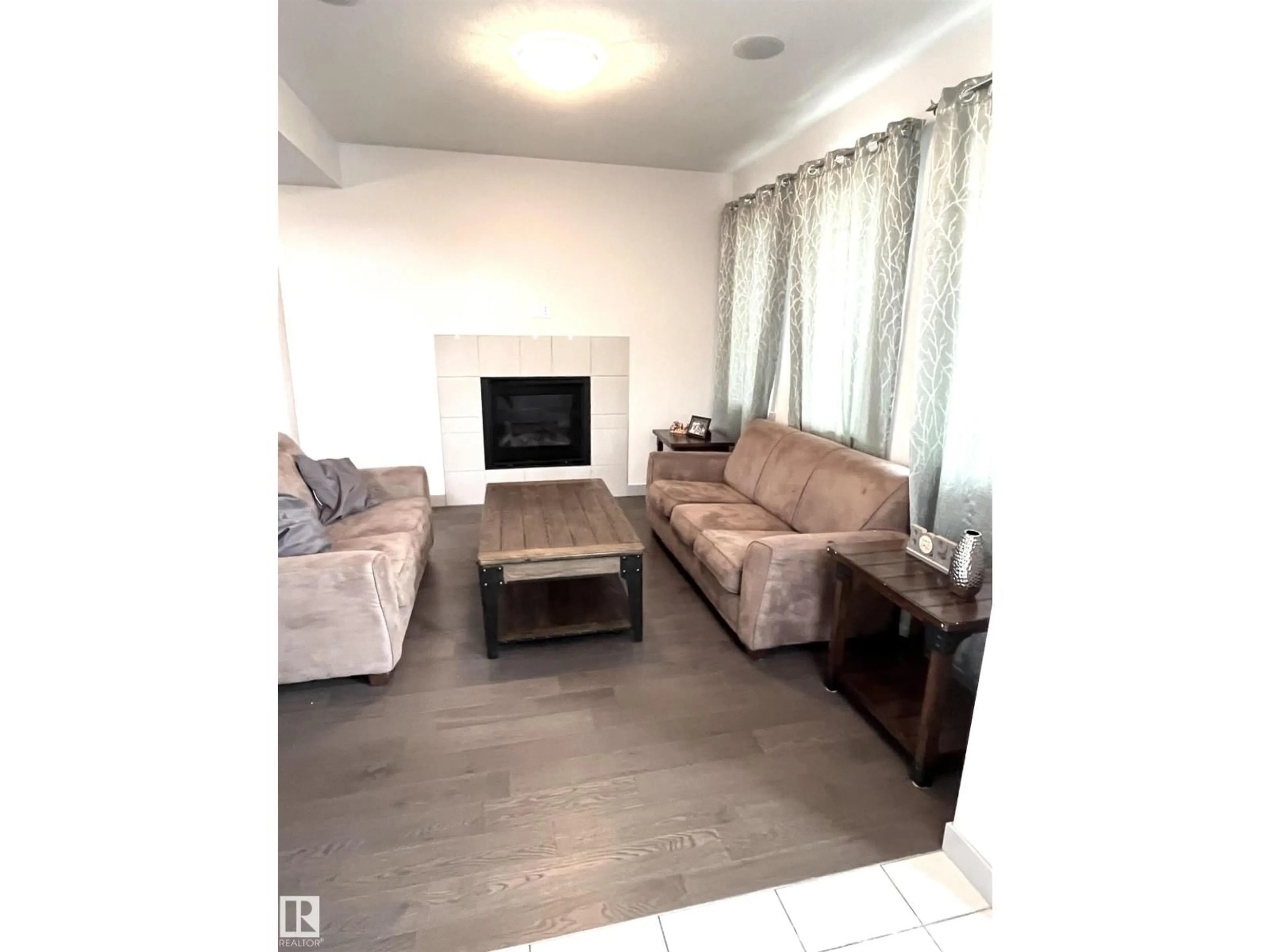 Living room with furniture, unknown for SW - 16464 15 AV, Edmonton Alberta T6W2Z7
