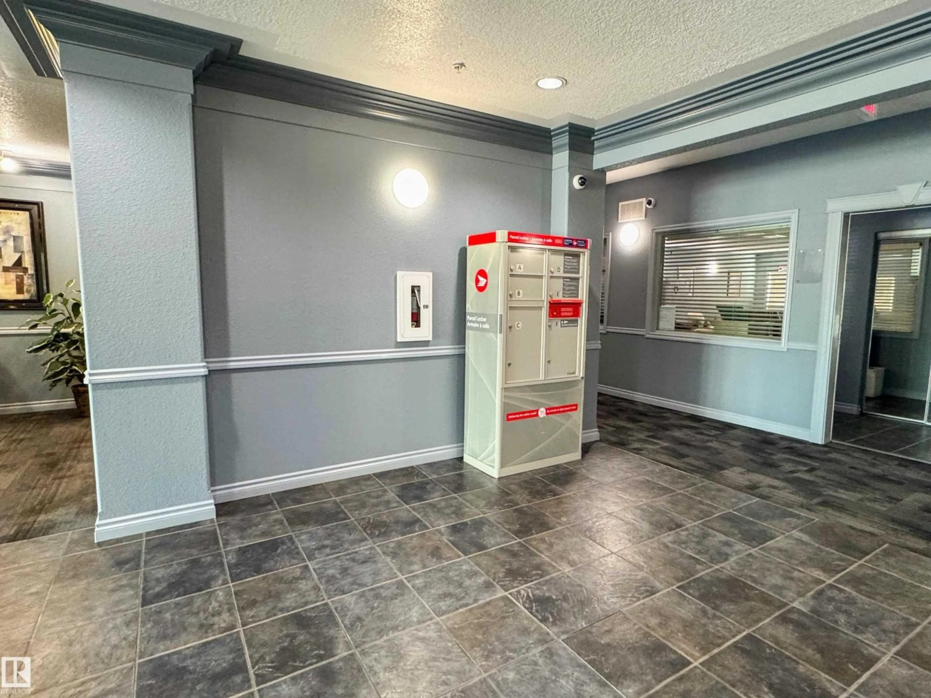 Indoor foyer for 524 - 9910 107 ST, Morinville Alberta T8R0A3