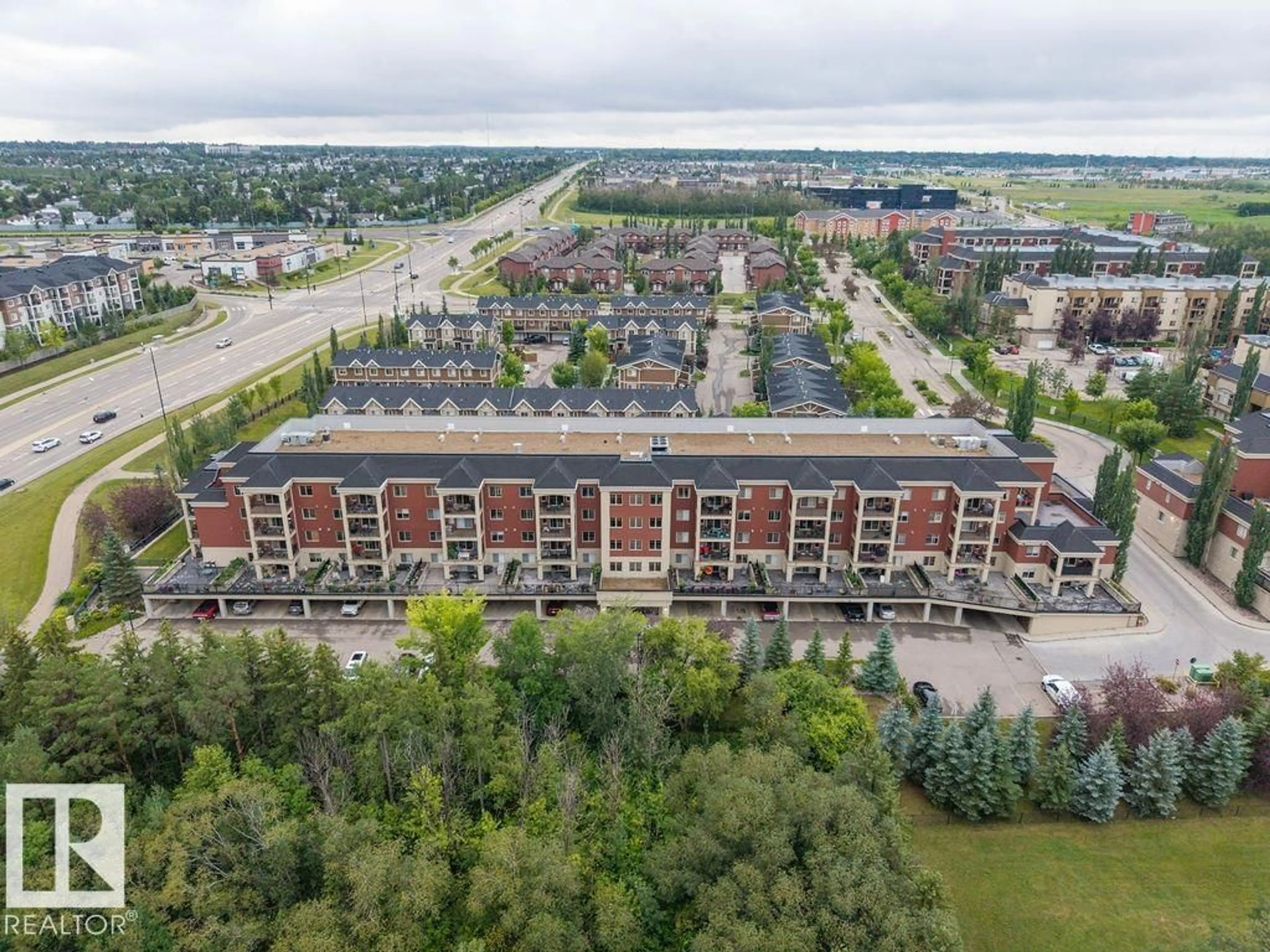 A pic from outside/outdoor area/front of a property/back of a property/a pic from drone, building for 404 - 501 PALISADES WY, Sherwood Park Alberta T8H0H8