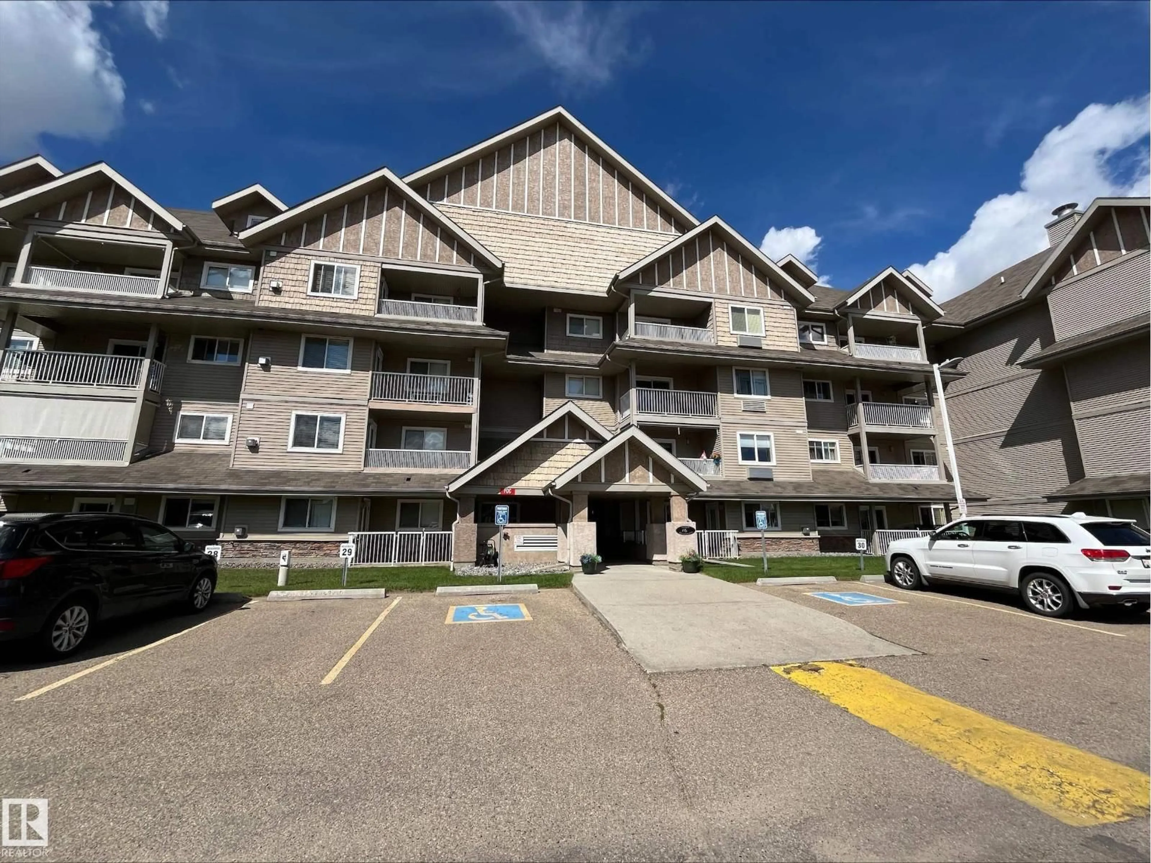 A pic from outside/outdoor area/front of a property/back of a property/a pic from drone, unknown for 204B SPRUCE RIDGE DR, Spruce Grove Alberta T7X4P4