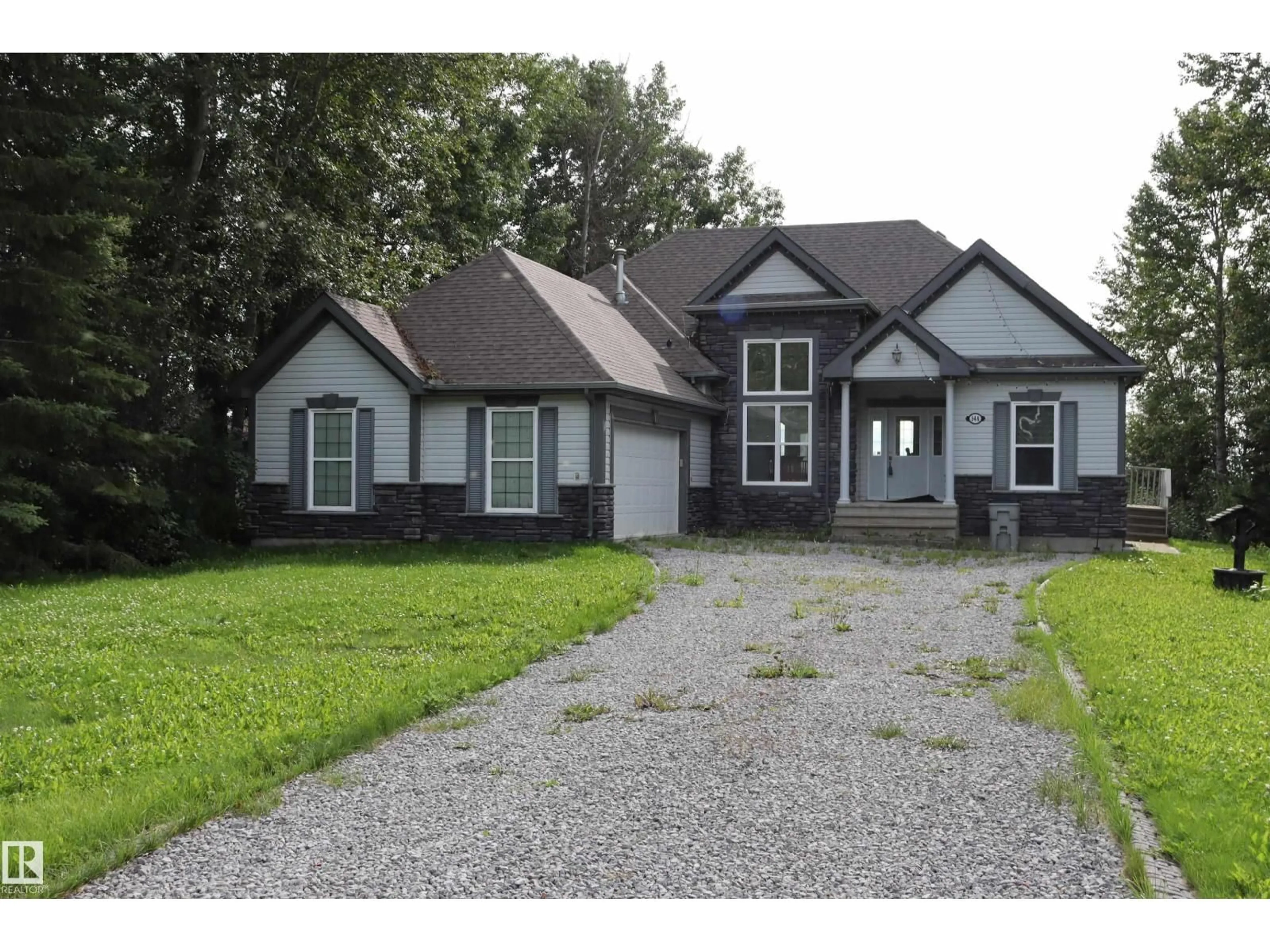 Home with vinyl exterior material, street for A54 JOHNSONIA, Rural Leduc County Alberta T0C2C0