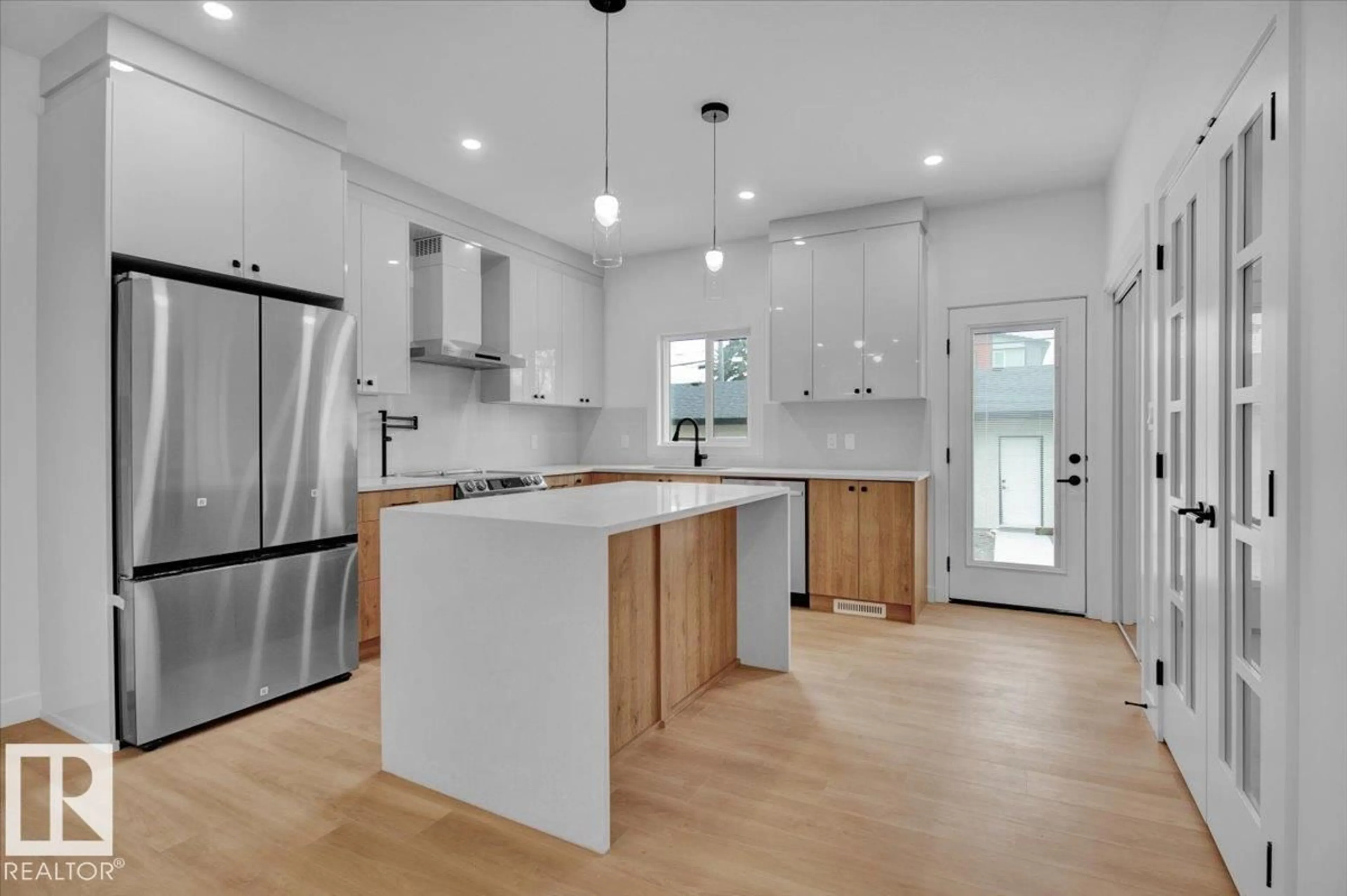 Open concept kitchen, unknown for 11126 132 ST, Edmonton Alberta T5M1E5