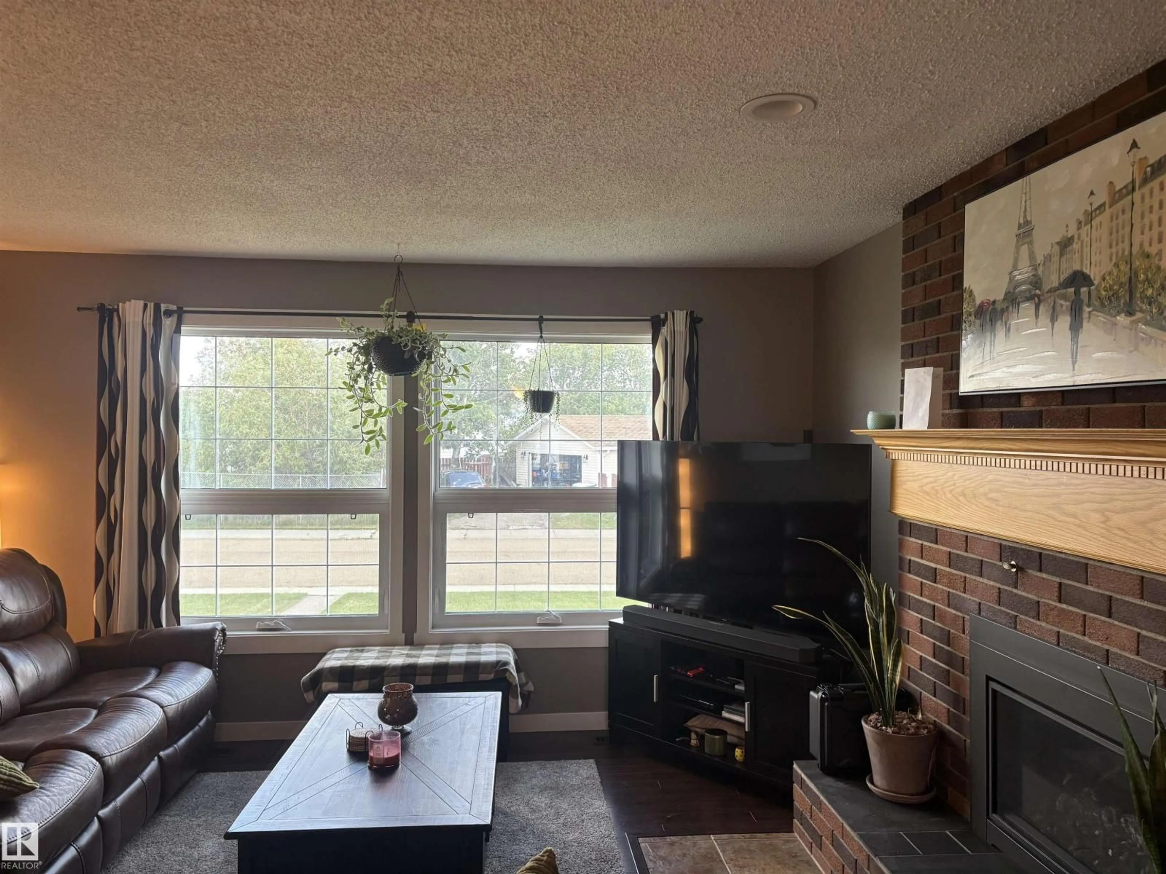 Living room with furniture, wood/laminate floor for 5420 51 STREET, Gibbons Alberta T0A1N0