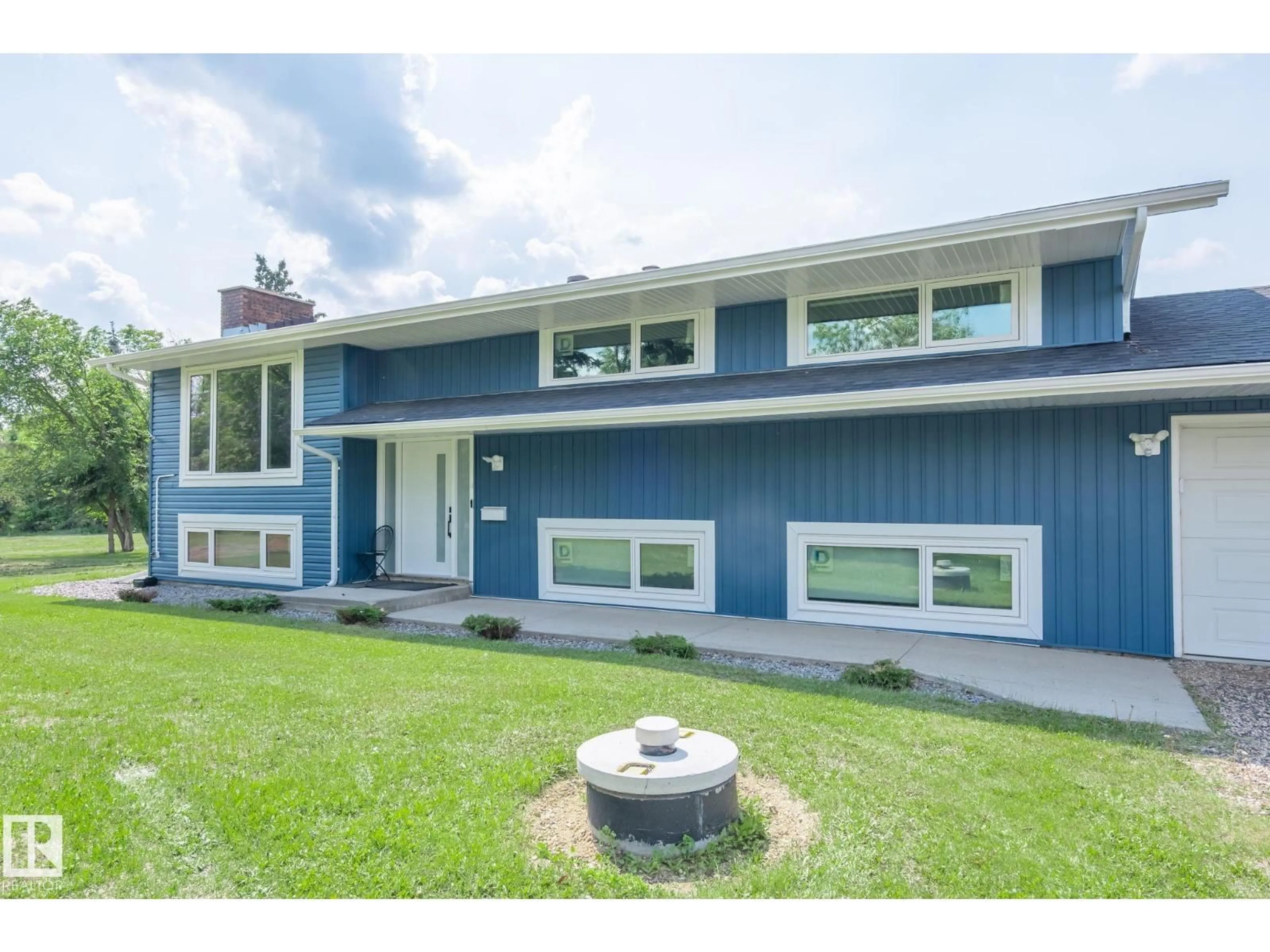Home with vinyl exterior material, street for 22550 - 253 TWP RD 522, Rural Strathcona County Alberta T8B1G8