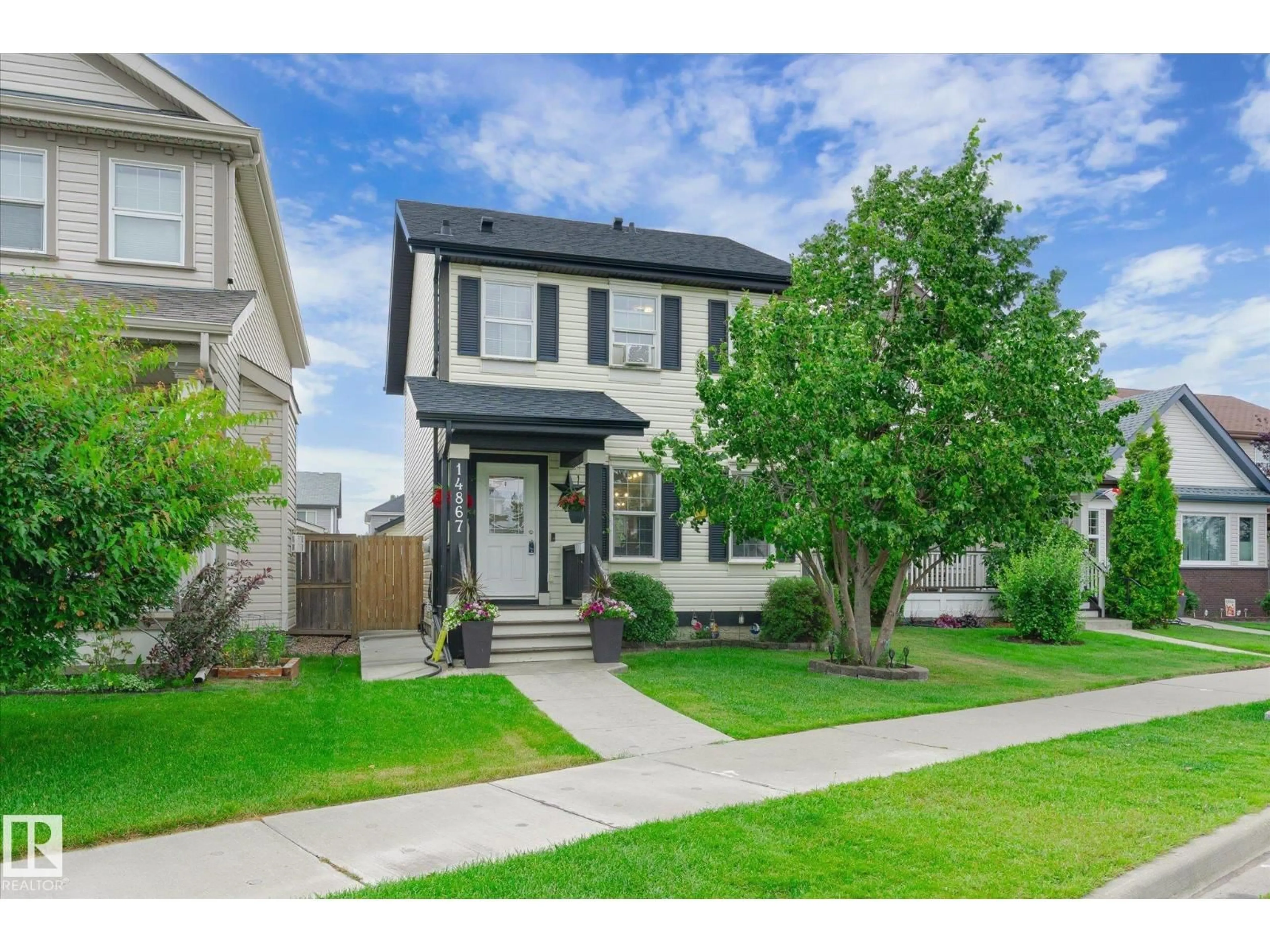 Home with vinyl exterior material, street for NW - 14867 141 ST, Edmonton Alberta T6V1S5