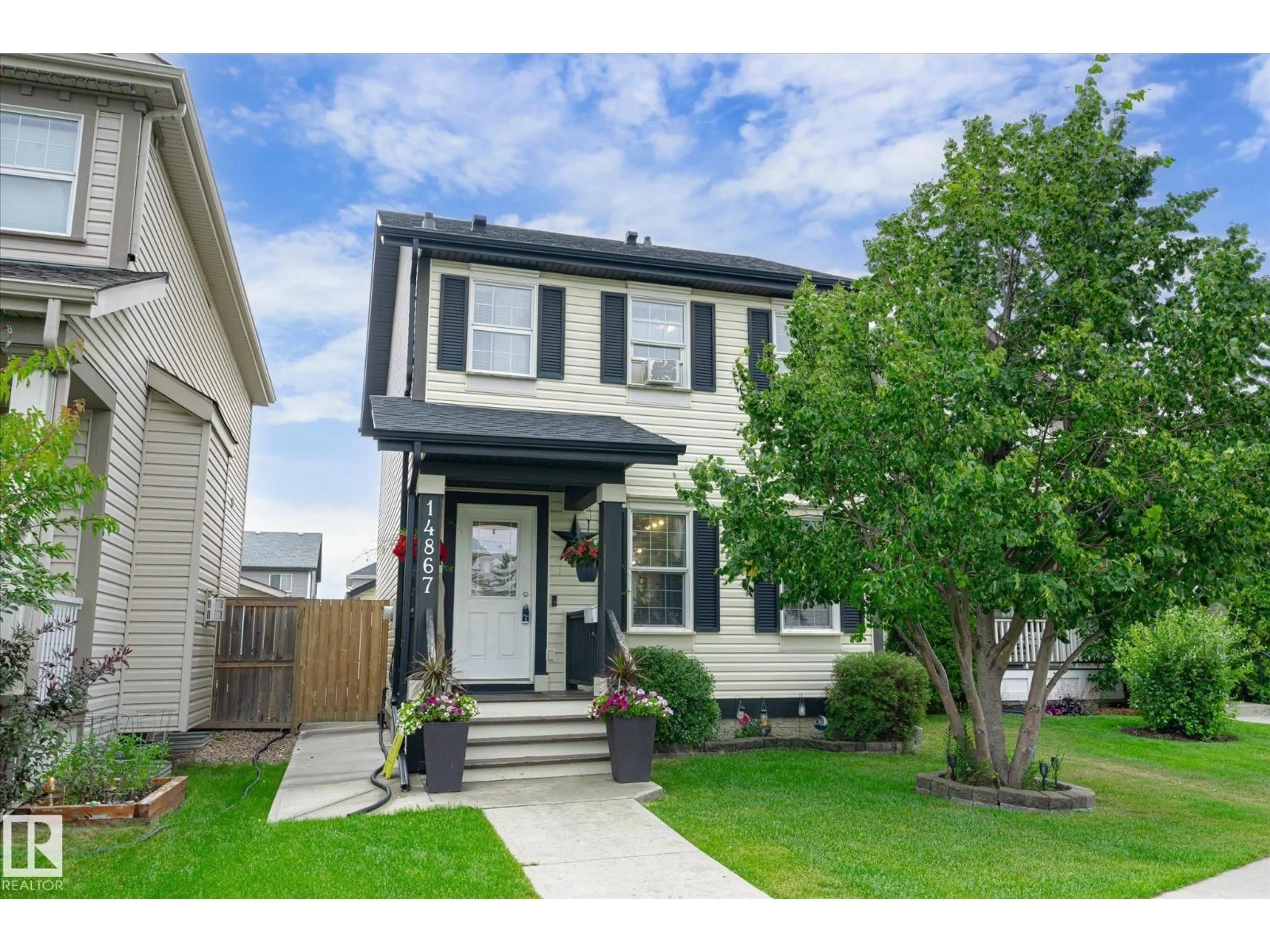 Home with vinyl exterior material, street for NW - 14867 141 ST, Edmonton Alberta T6V1S5