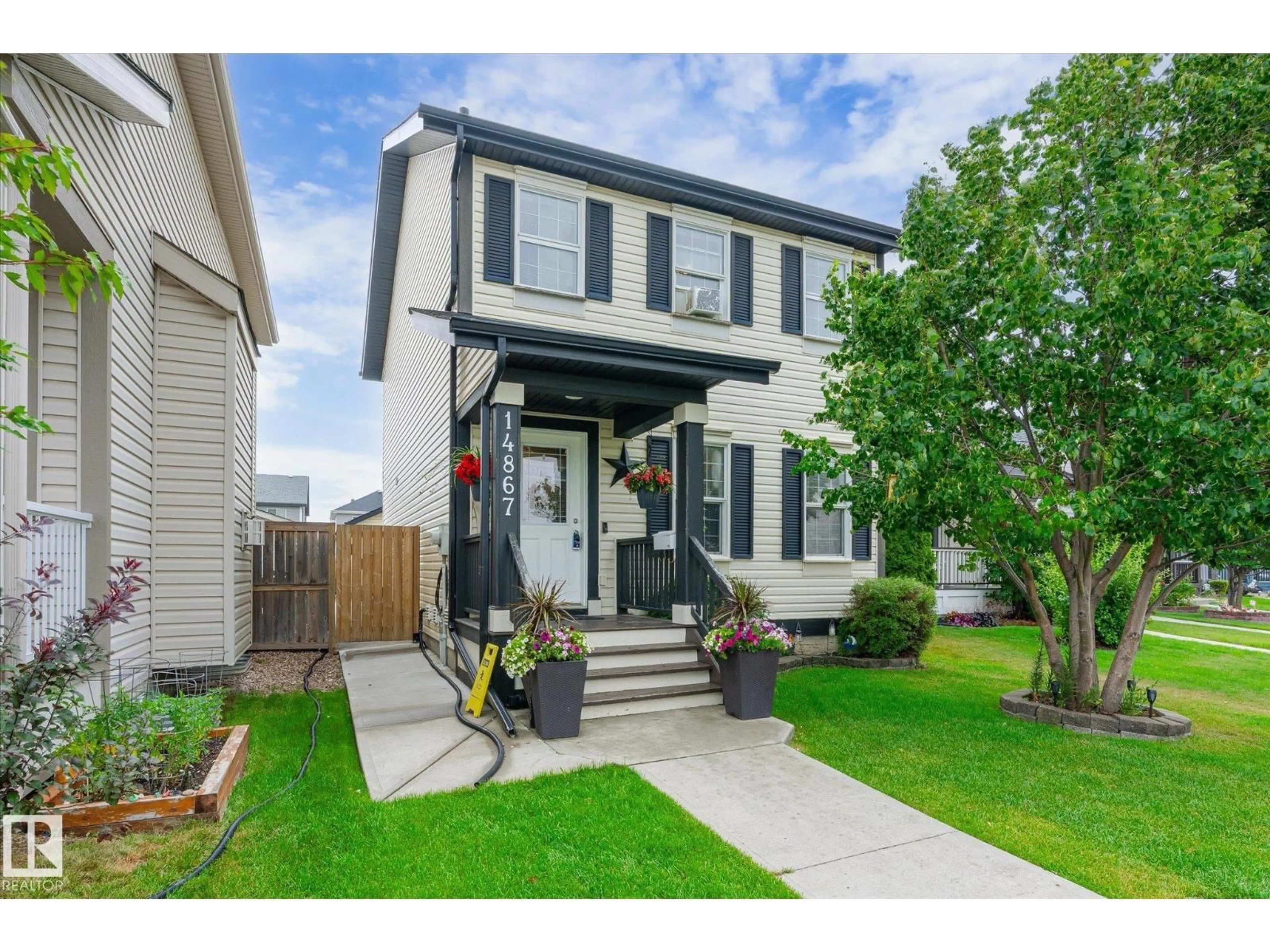 Home with vinyl exterior material, street for NW - 14867 141 ST, Edmonton Alberta T6V1S5