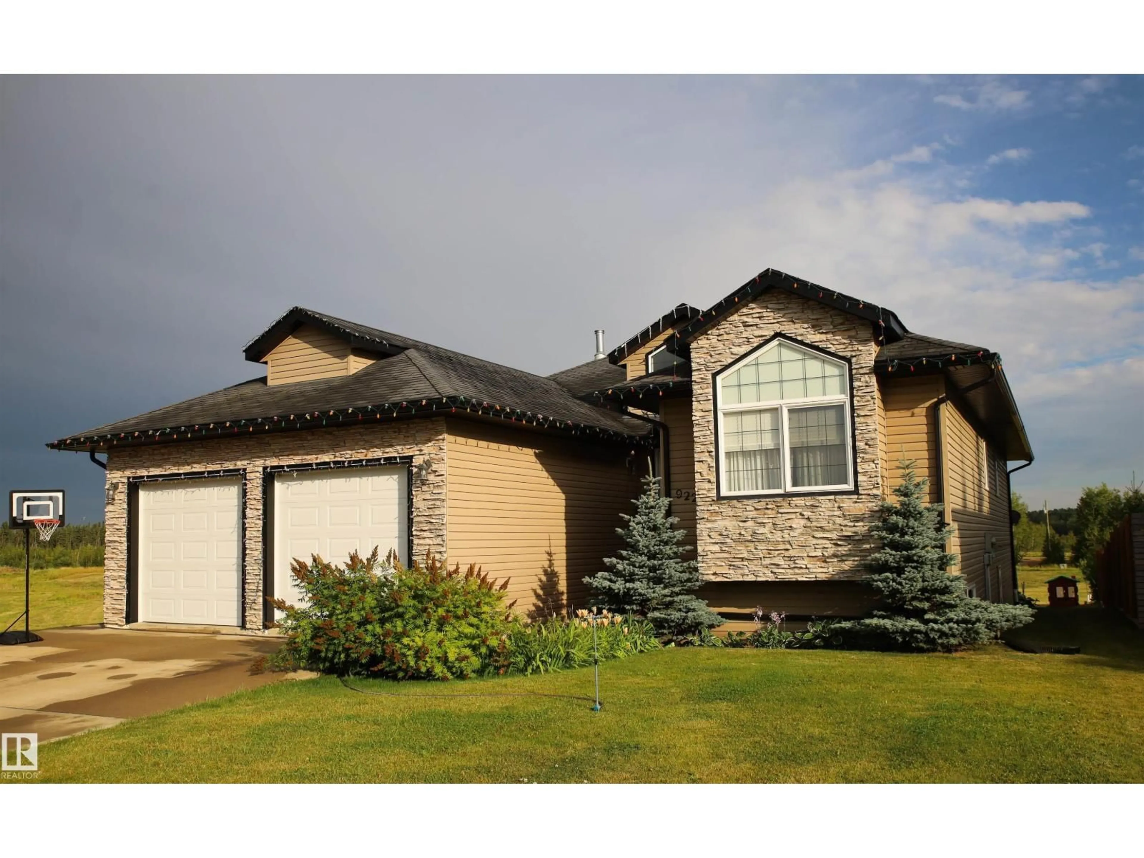 Home with vinyl exterior material, street for 9221 91 AVENUE, Lac La Biche Alberta T0A2C0
