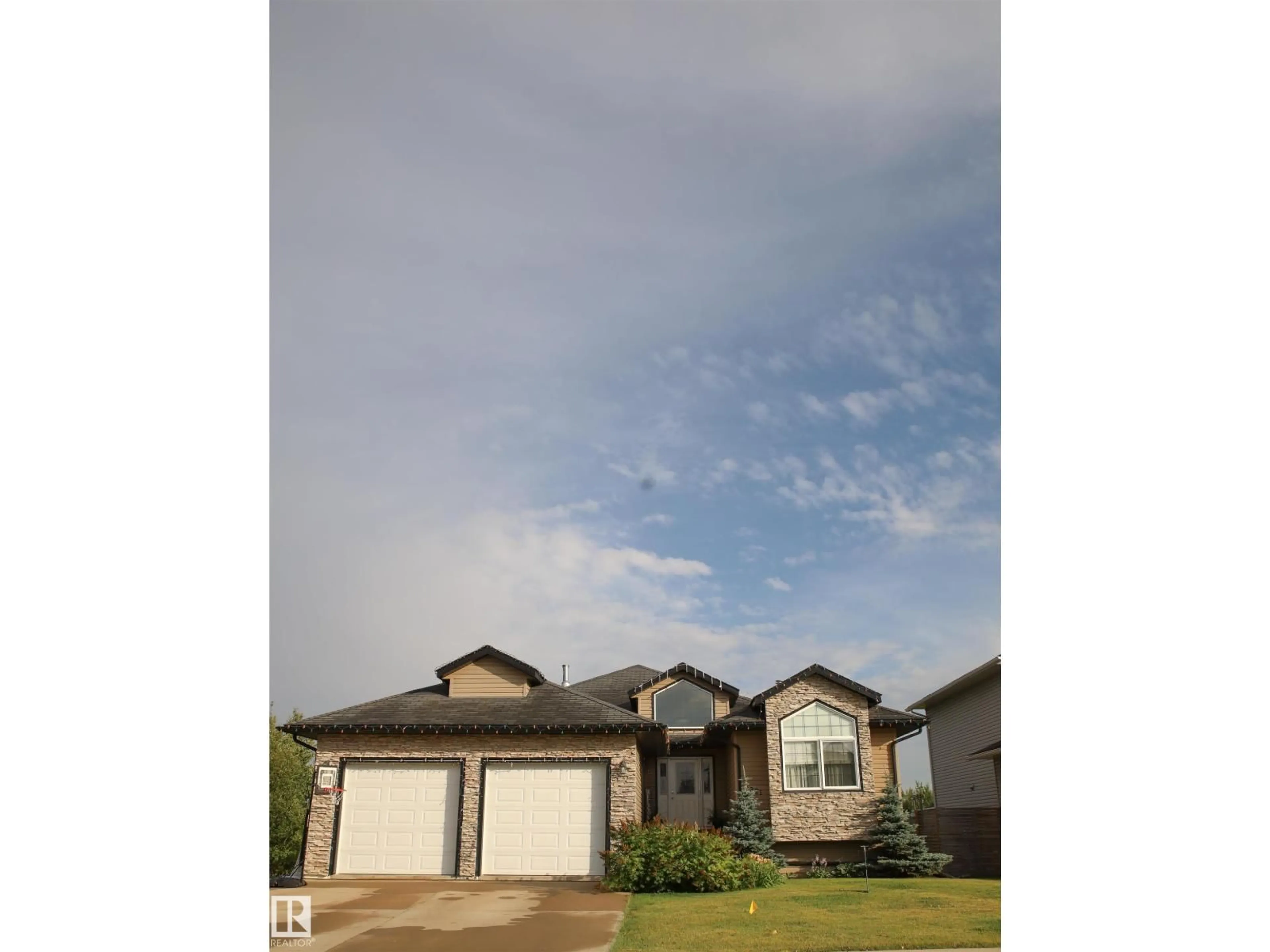 Home with vinyl exterior material, street for 9221 91 AVENUE, Lac La Biche Alberta T0A2C0