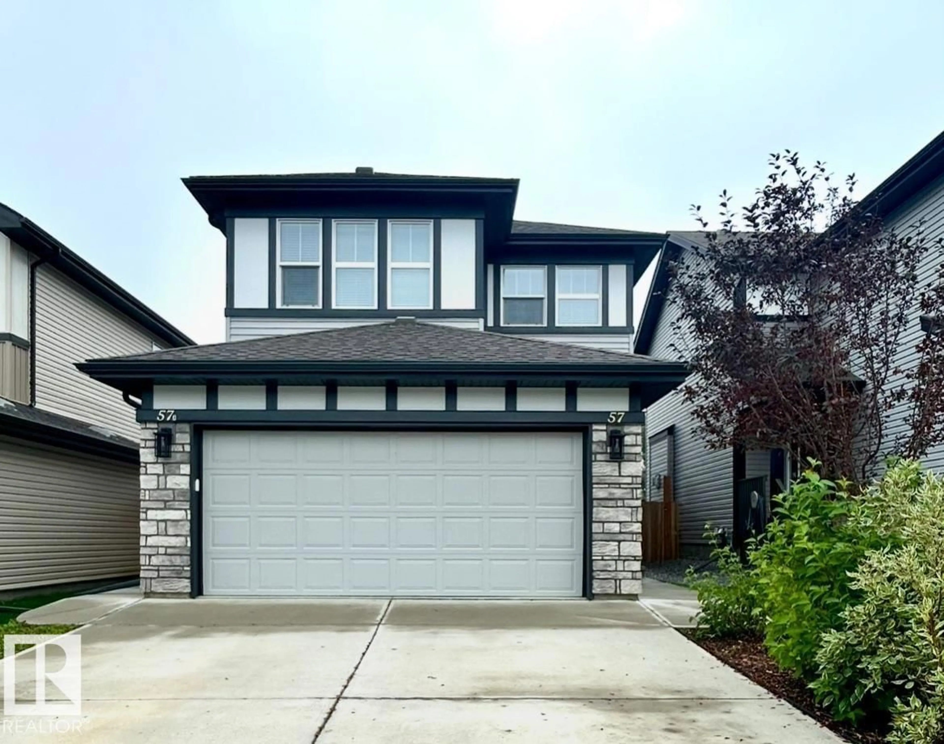Home with vinyl exterior material, street for 57 SPRING GA, Spruce Grove Alberta T7X0A5
