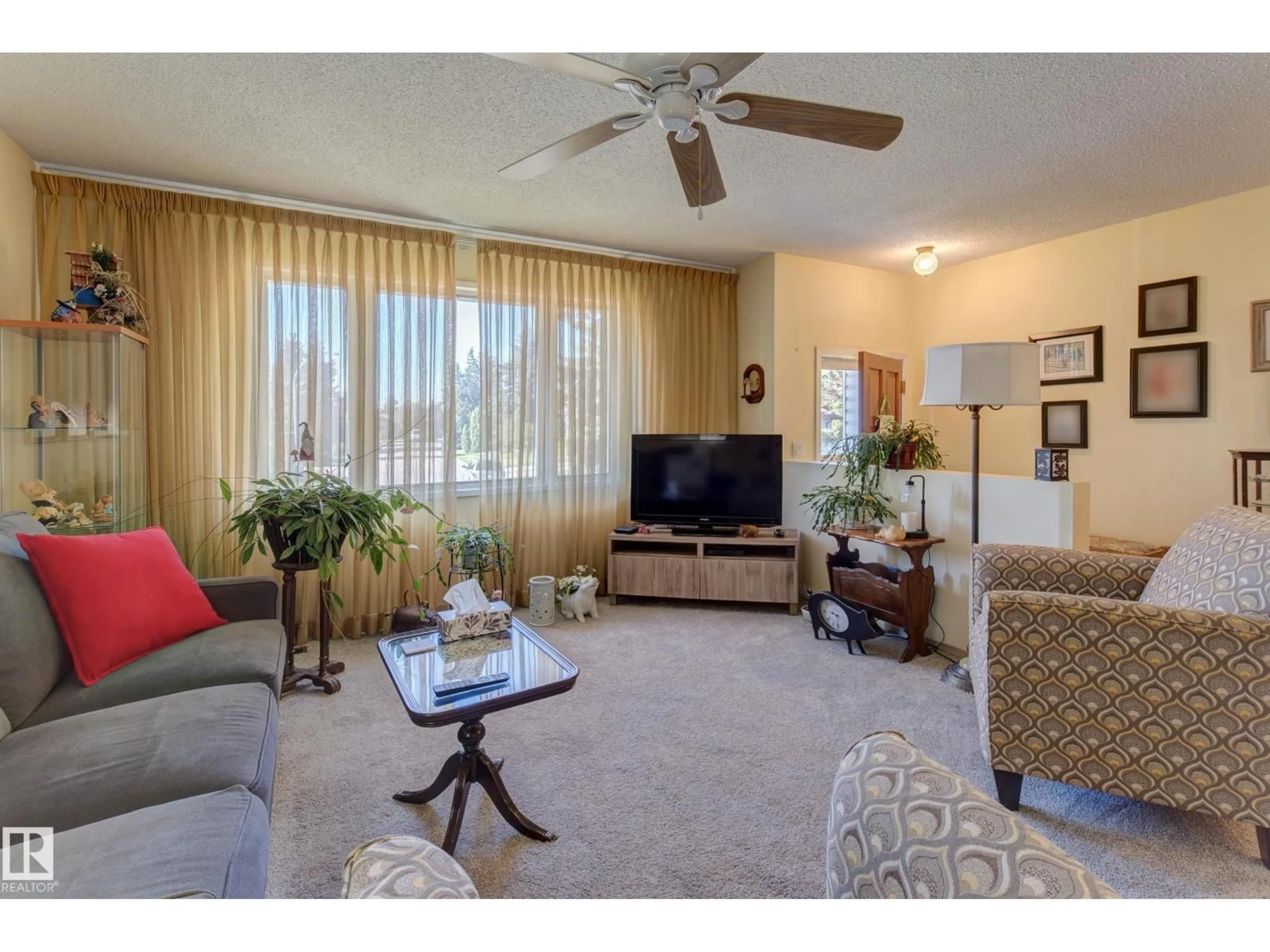 Living room with furniture, unknown for 6228 13 AV, Edmonton Alberta T6L2E6