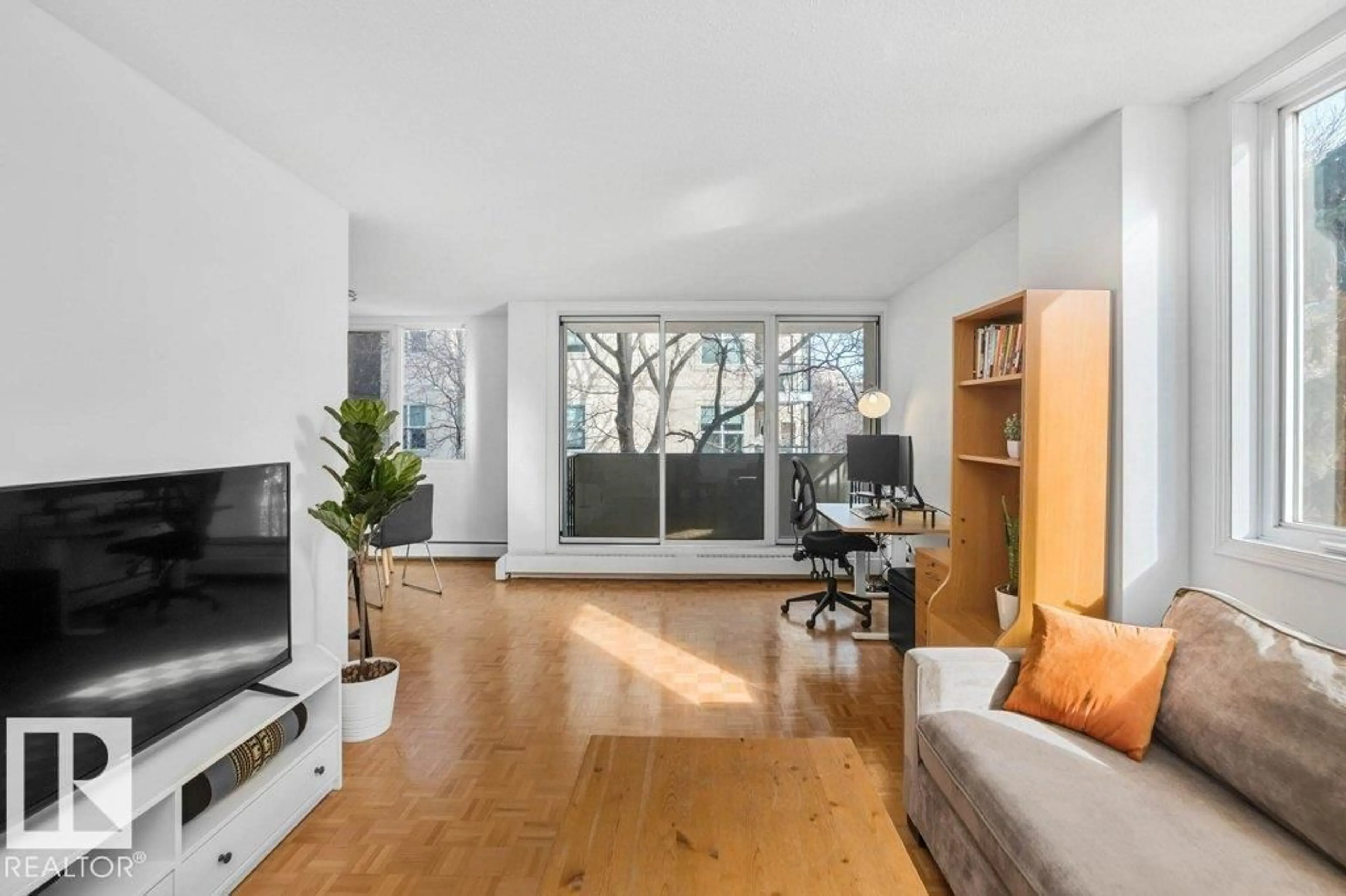 Living room with furniture, wood/laminate floor for #306 - 9816 112 ST, Edmonton Alberta T5K1L5