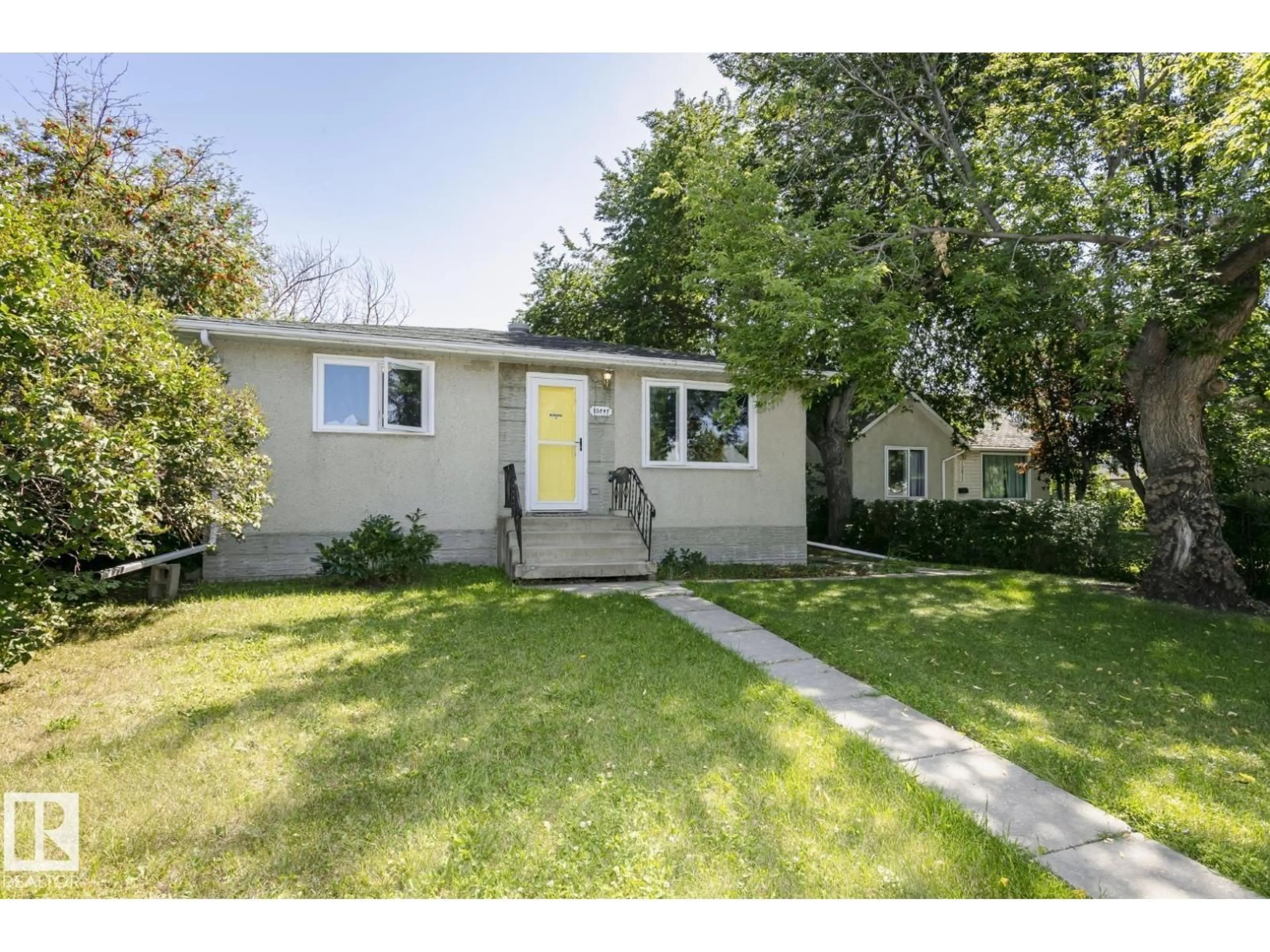 Home with vinyl exterior material, street for NW - 10841 154 ST, Edmonton Alberta T5P2J6