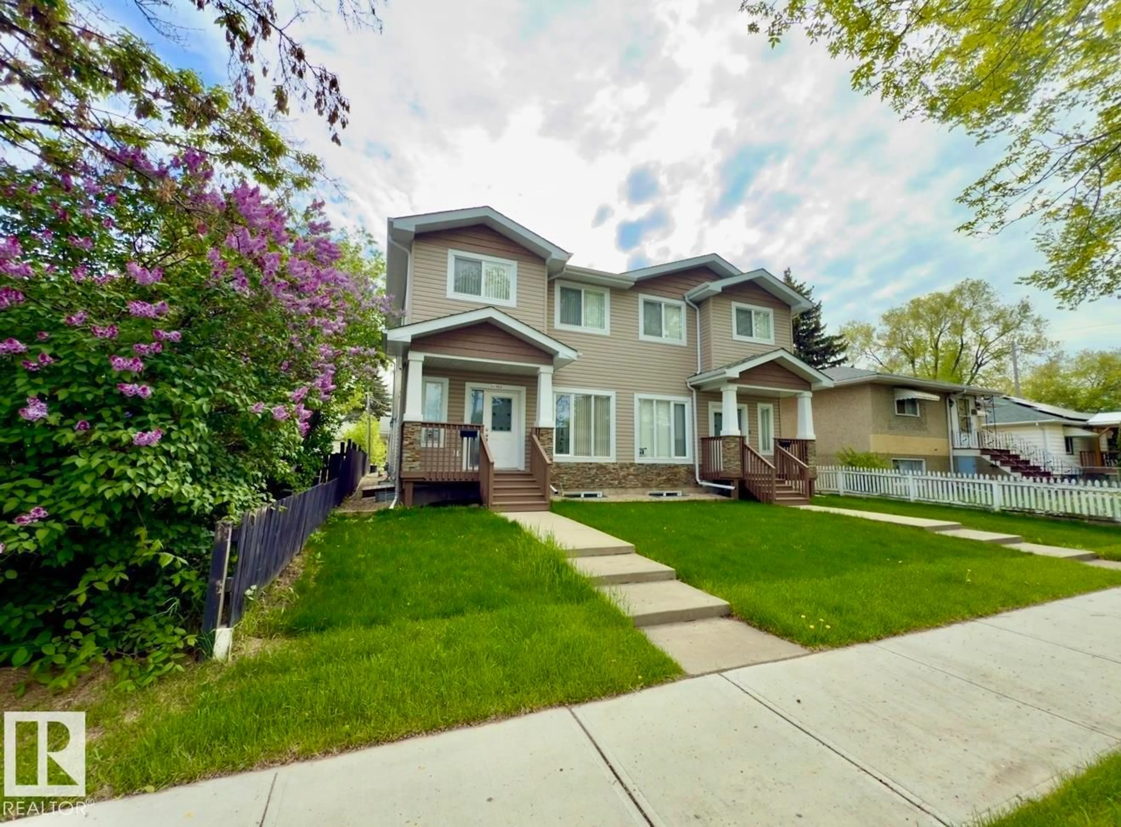Home with vinyl exterior material, street for 12913 124 ST, Edmonton Alberta T5L0P6