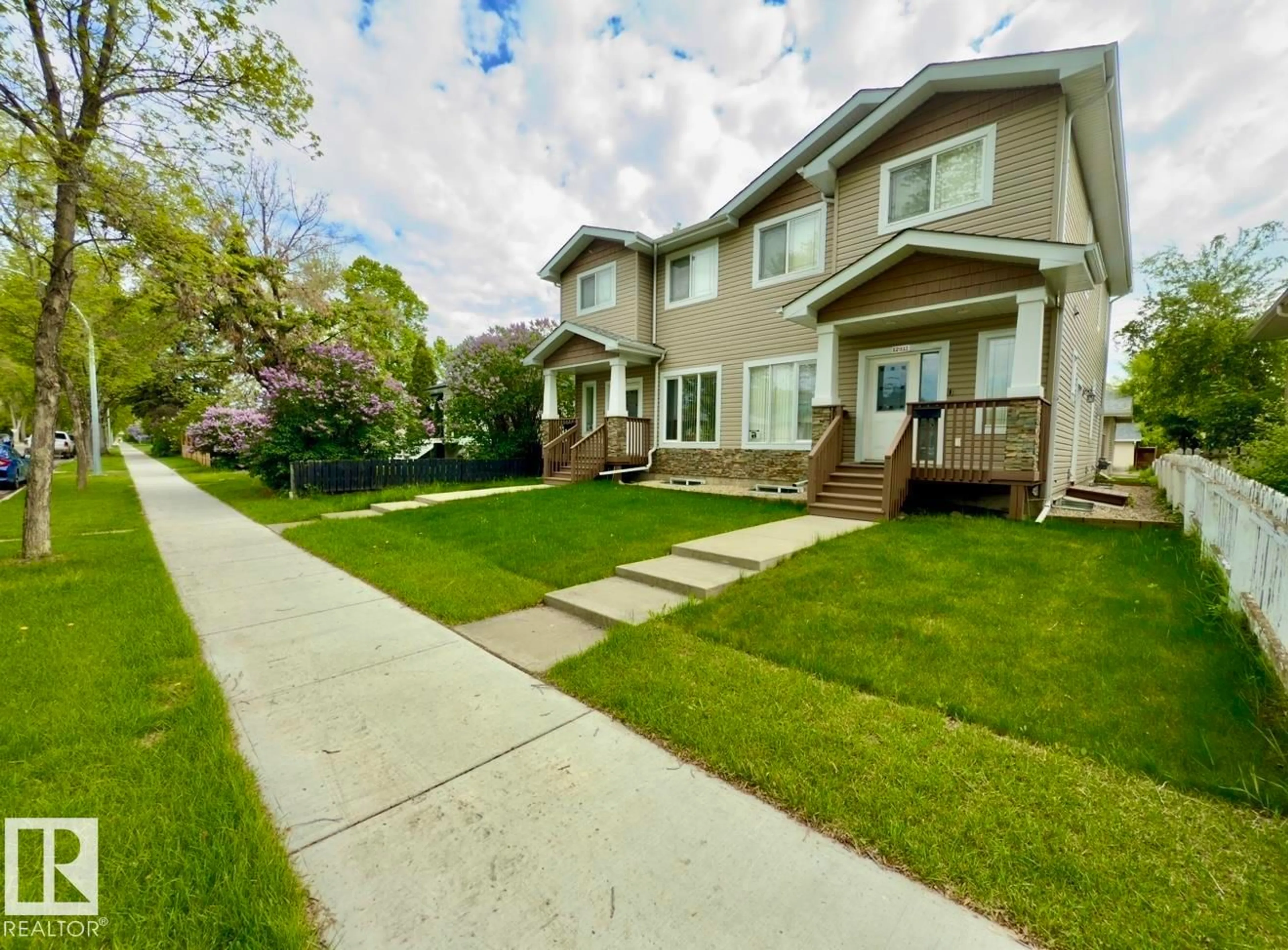 Home with vinyl exterior material, street for 12913 124 ST, Edmonton Alberta T5L0P6