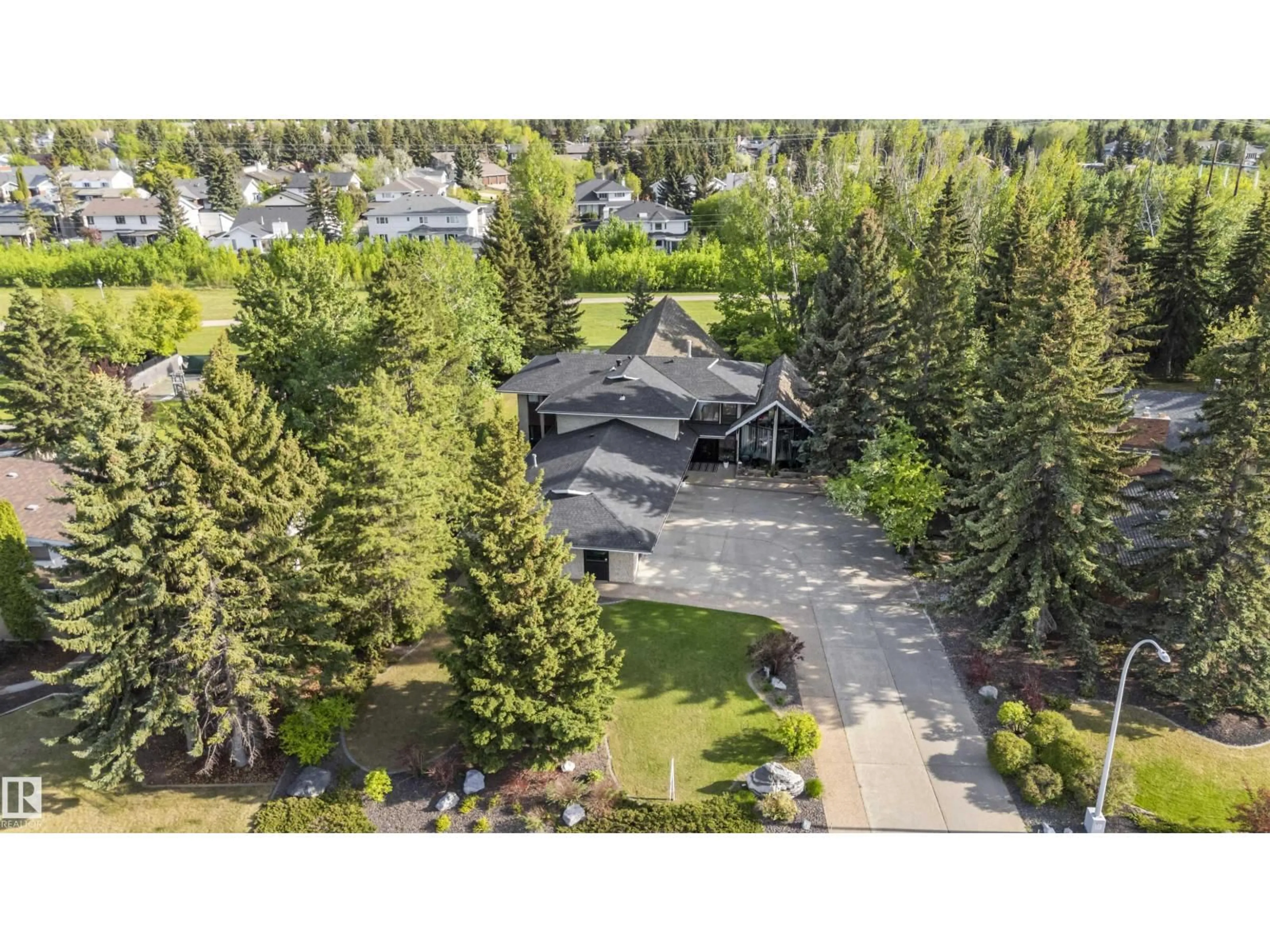 A pic from outside/outdoor area/front of a property/back of a property/a pic from drone, forest/trees view for 23 WESTBROOK DR, Edmonton Alberta T6J2C8
