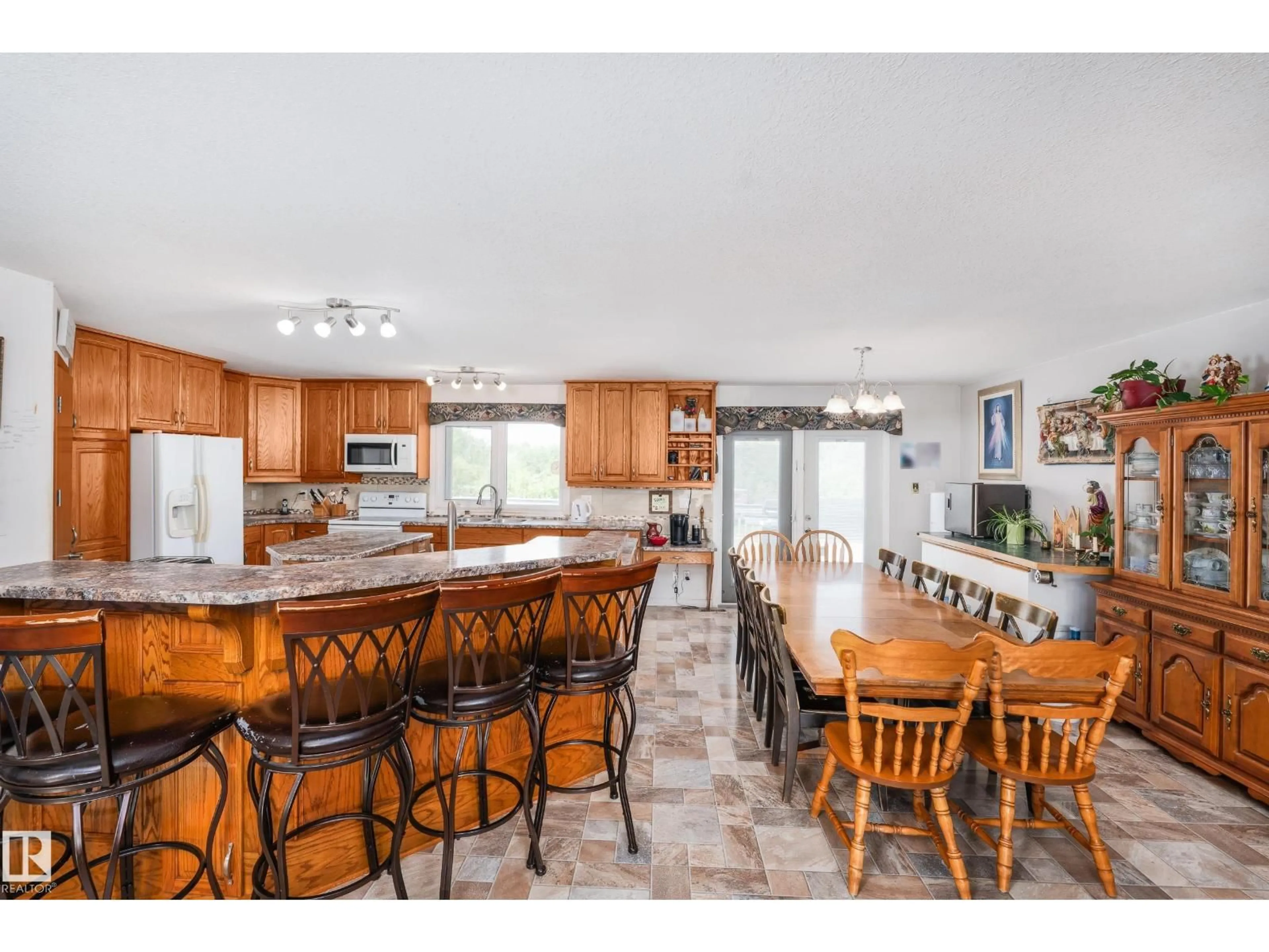Open concept kitchen, ceramic/tile floor for 145 22458 TWP ROAD 510, Rural Strathcona County Alberta T8C1H1