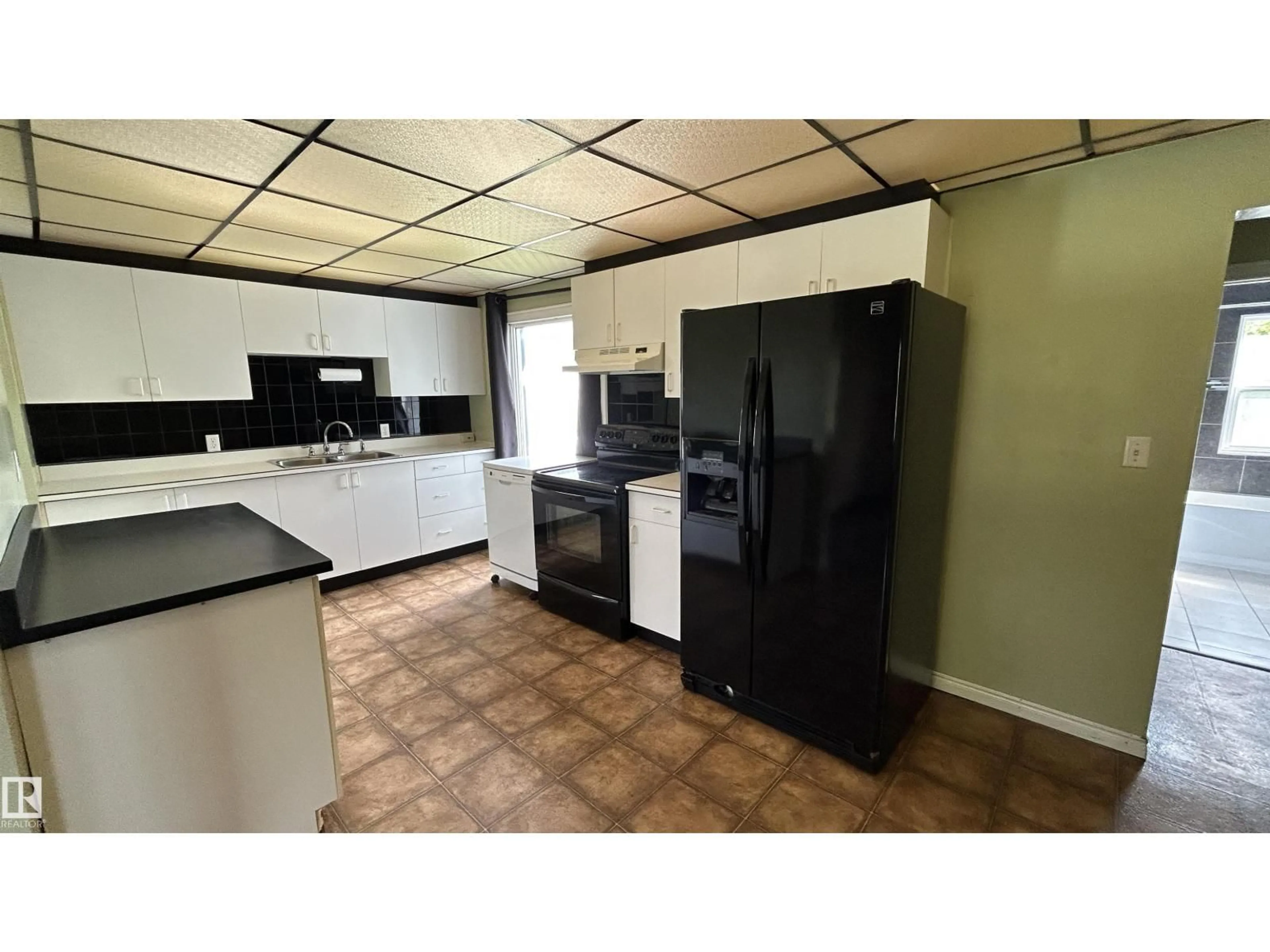 Standard kitchen, ceramic/tile floor for 4911 51 ST, Fort Kent Alberta T9N1H0