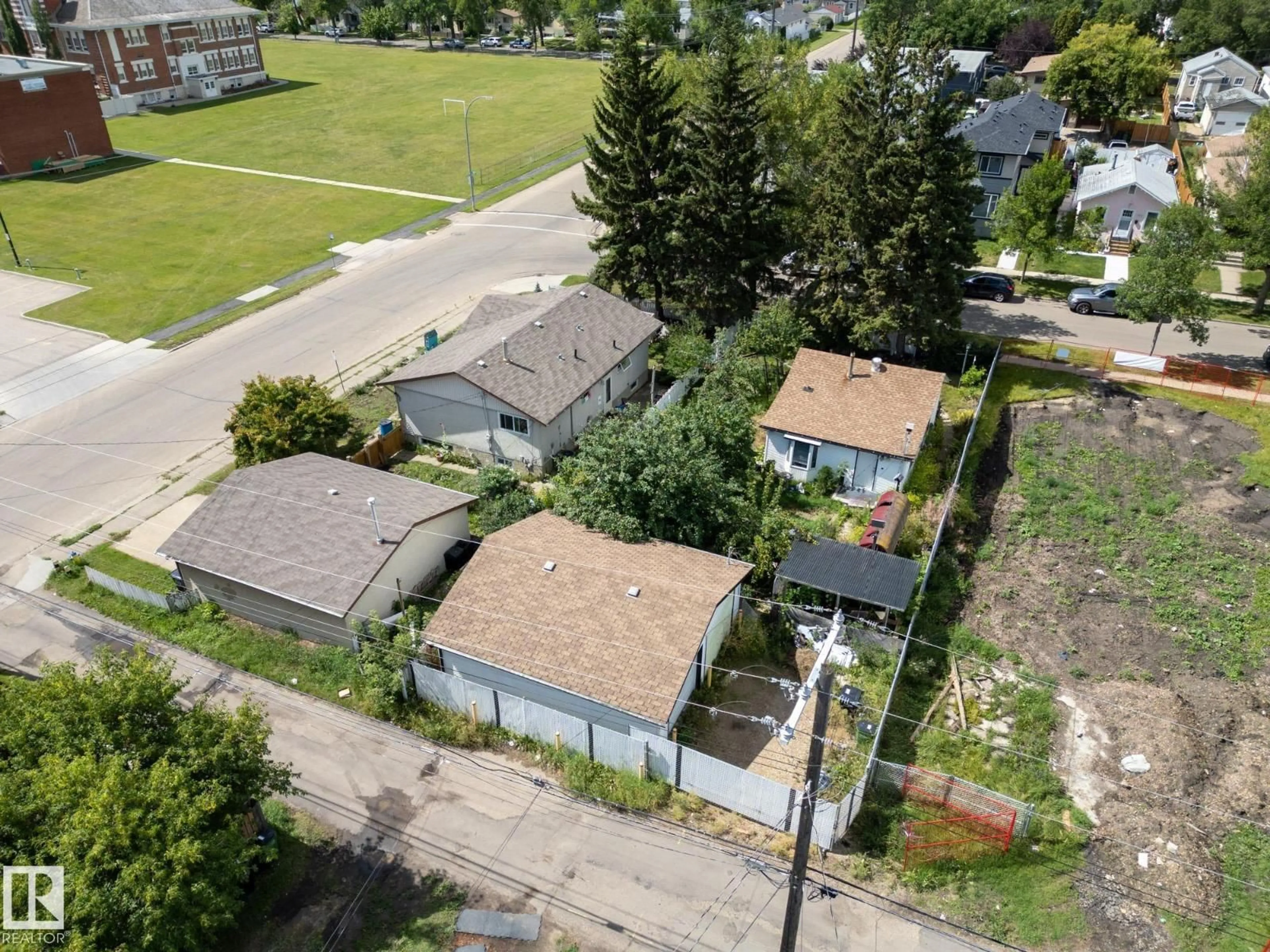 A pic from outside/outdoor area/front of a property/back of a property/a pic from drone, street for 12909 69 ST, Edmonton Alberta T5C0H3