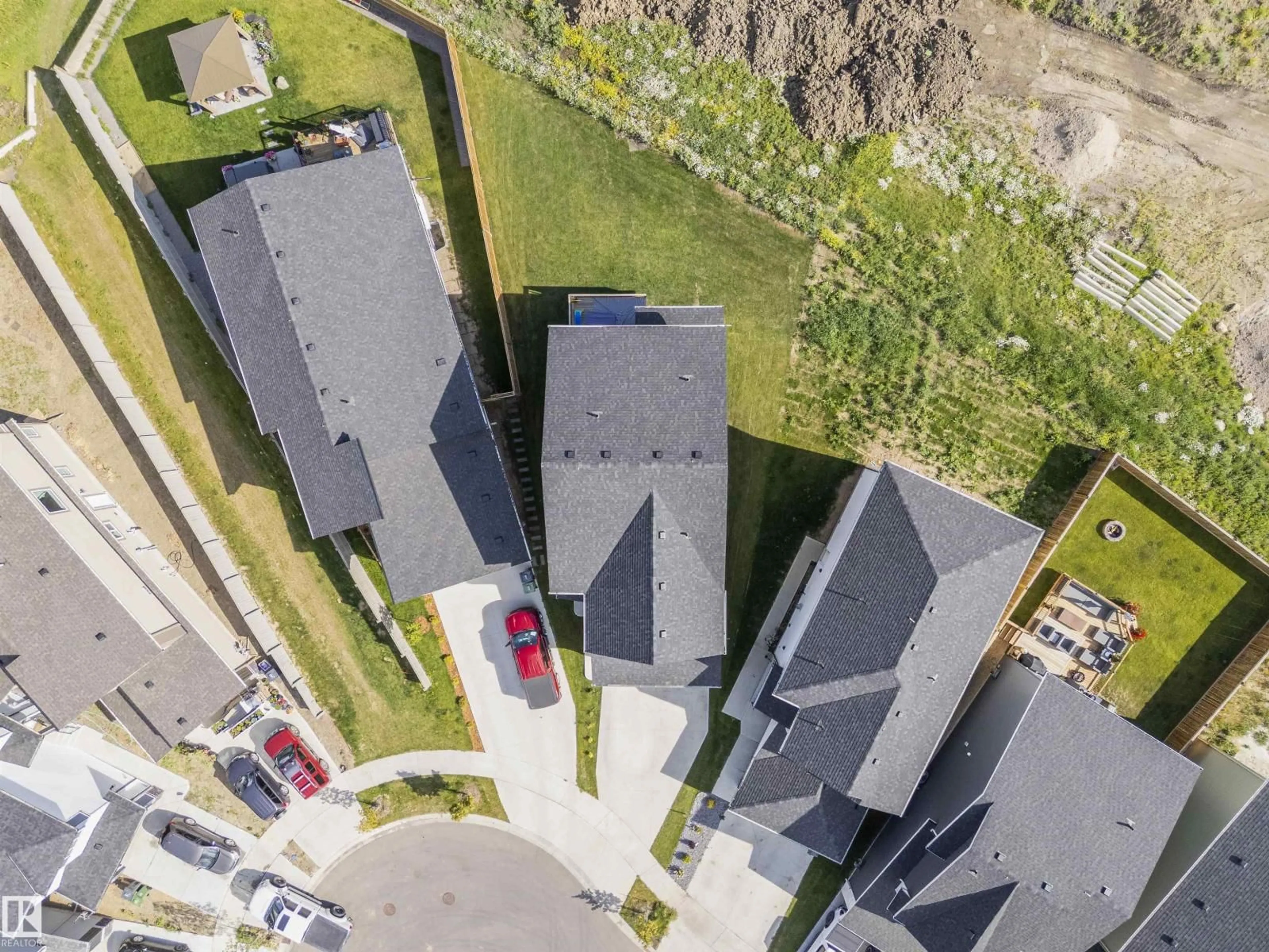 A pic from outside/outdoor area/front of a property/back of a property/a pic from drone, street for 6205 46 AV, Beaumont Alberta T4X2Z2