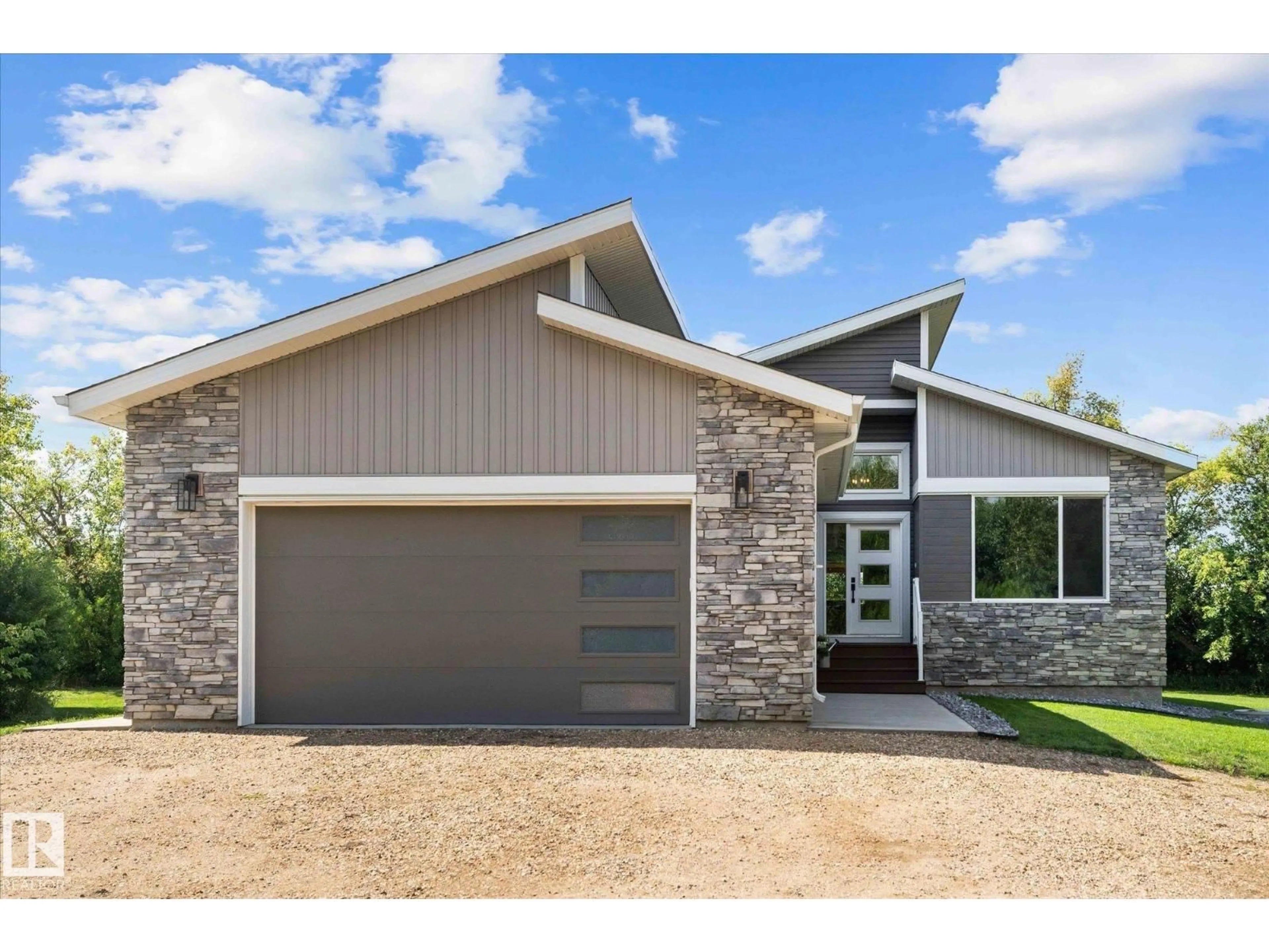 Home with brick exterior material, street for 573002 RGE RD 201, Rural Lamont County Alberta T0B0S9