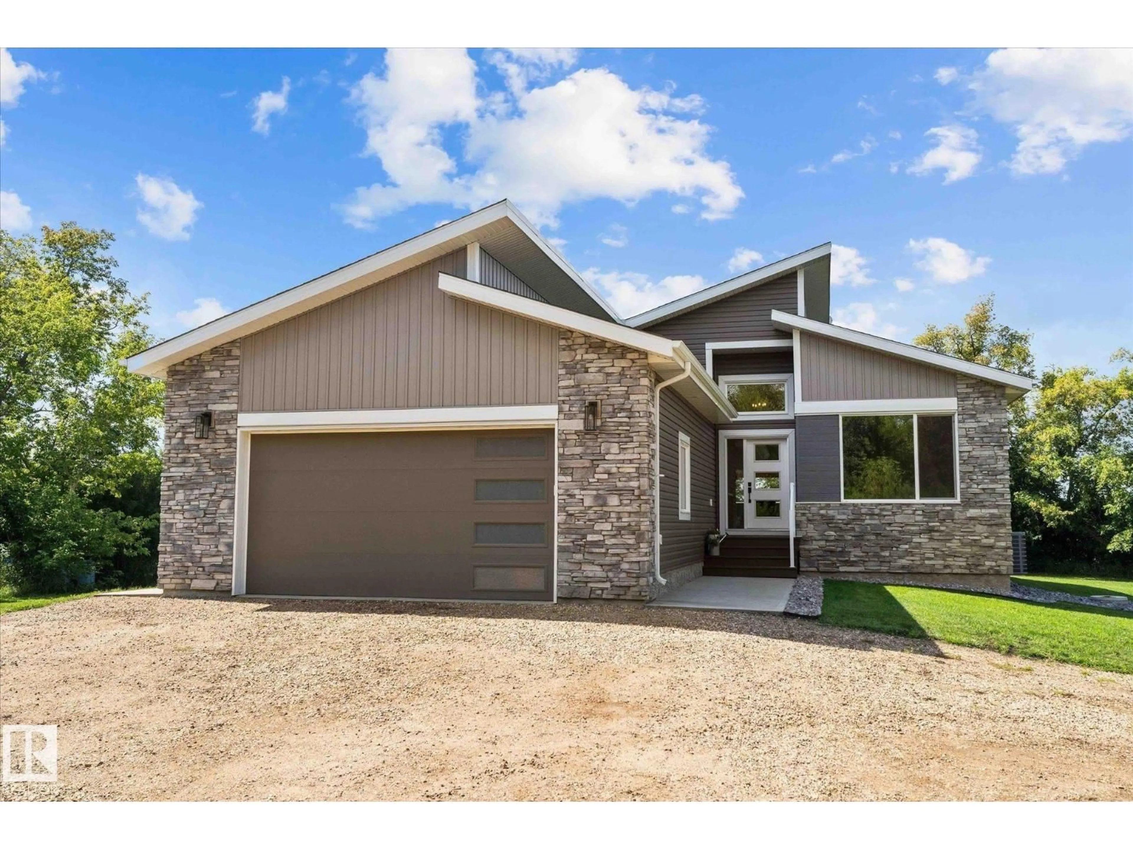 Home with brick exterior material, street for 573002 RGE RD 201, Rural Lamont County Alberta T0B0S9
