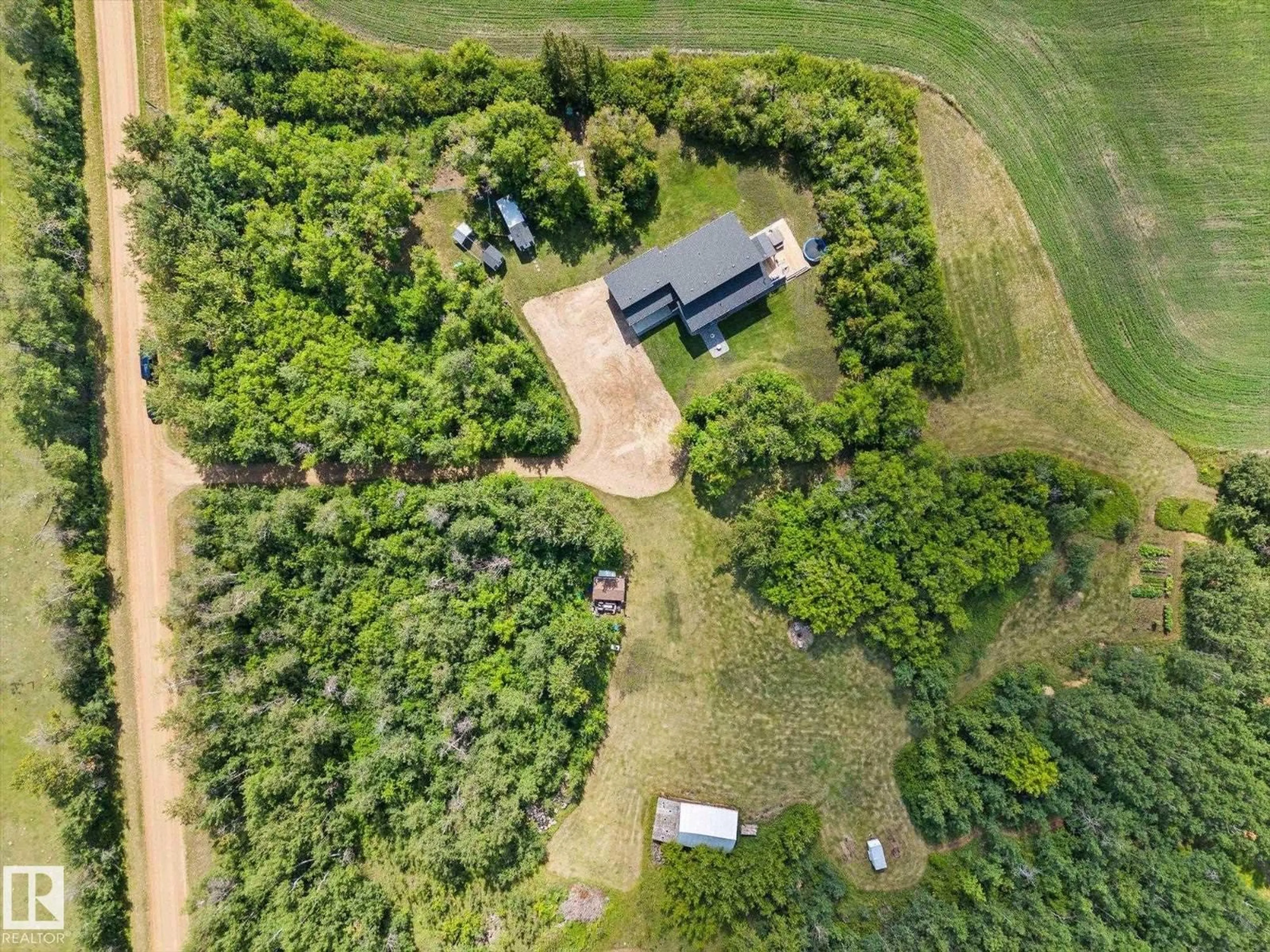A pic from outside/outdoor area/front of a property/back of a property/a pic from drone, forest/trees view for 573002 RGE RD 201, Rural Lamont County Alberta T0B0S9