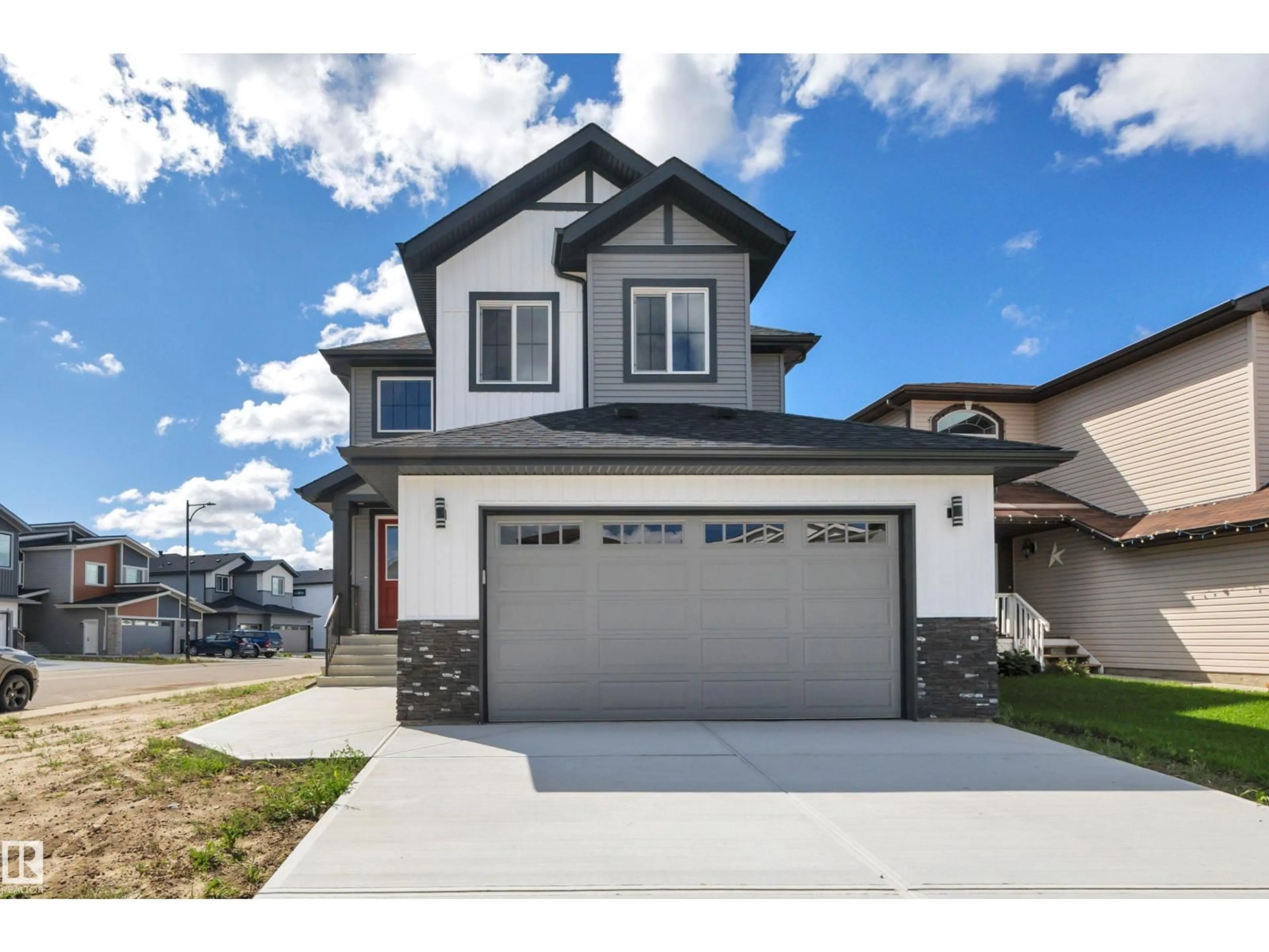 Home with vinyl exterior material, street for 67 DALQUIST BA, Leduc Alberta T9E1N7