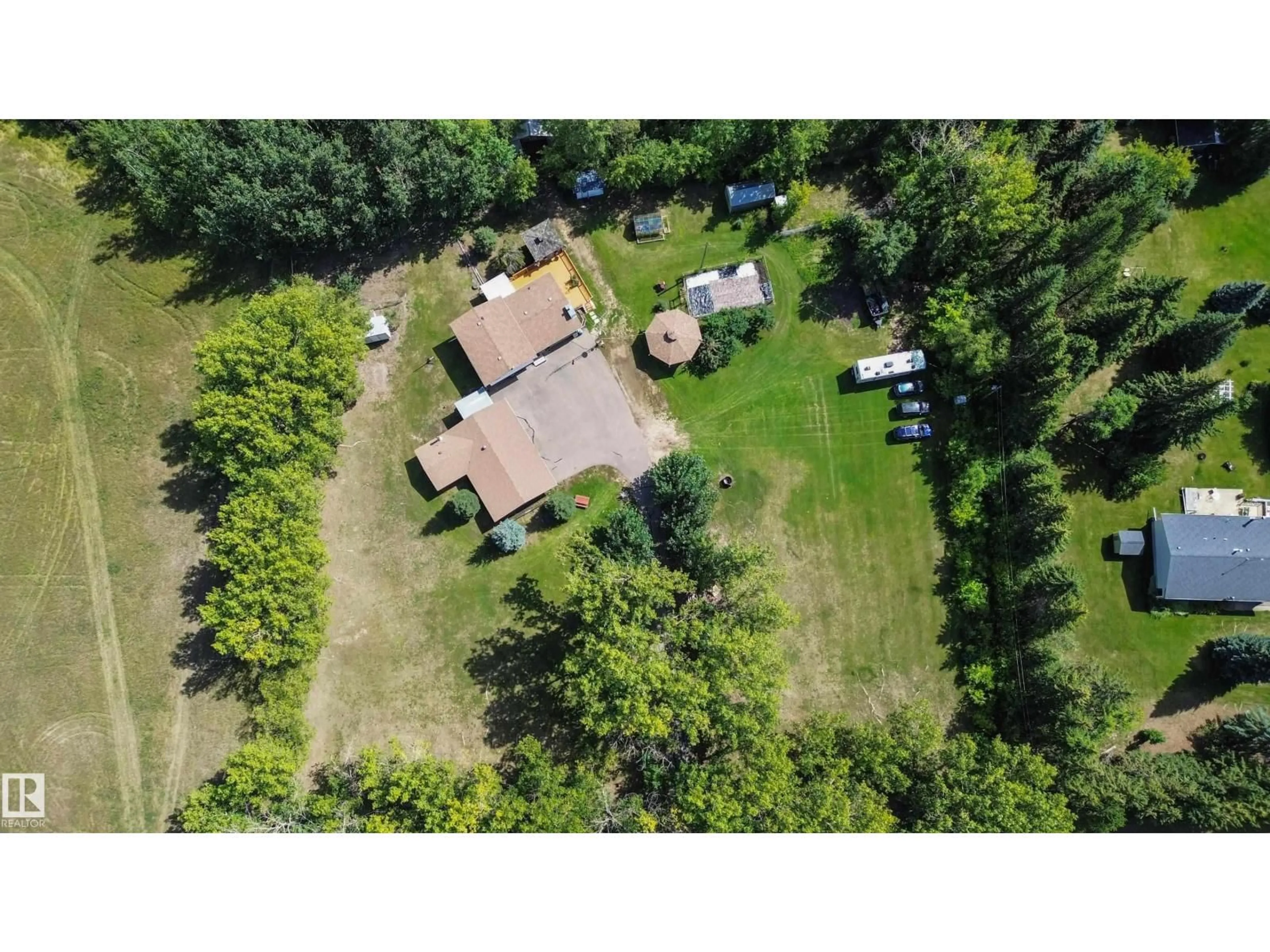 A pic from outside/outdoor area/front of a property/back of a property/a pic from drone, forest/trees view for 26 OAKWOOD DR, Rural Parkland County Alberta T7X2T4