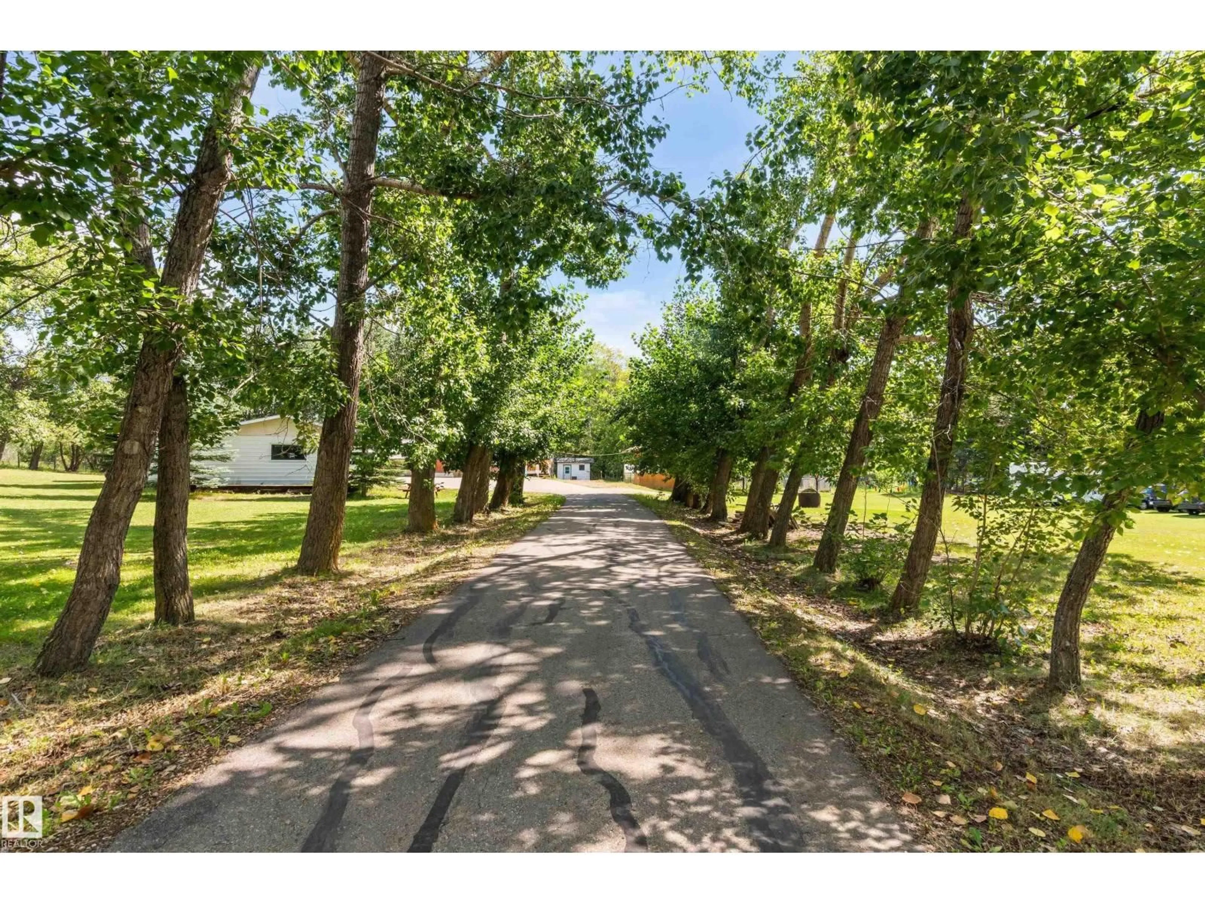 A pic from outside/outdoor area/front of a property/back of a property/a pic from drone, forest/trees view for 26 OAKWOOD DR, Rural Parkland County Alberta T7X2T4