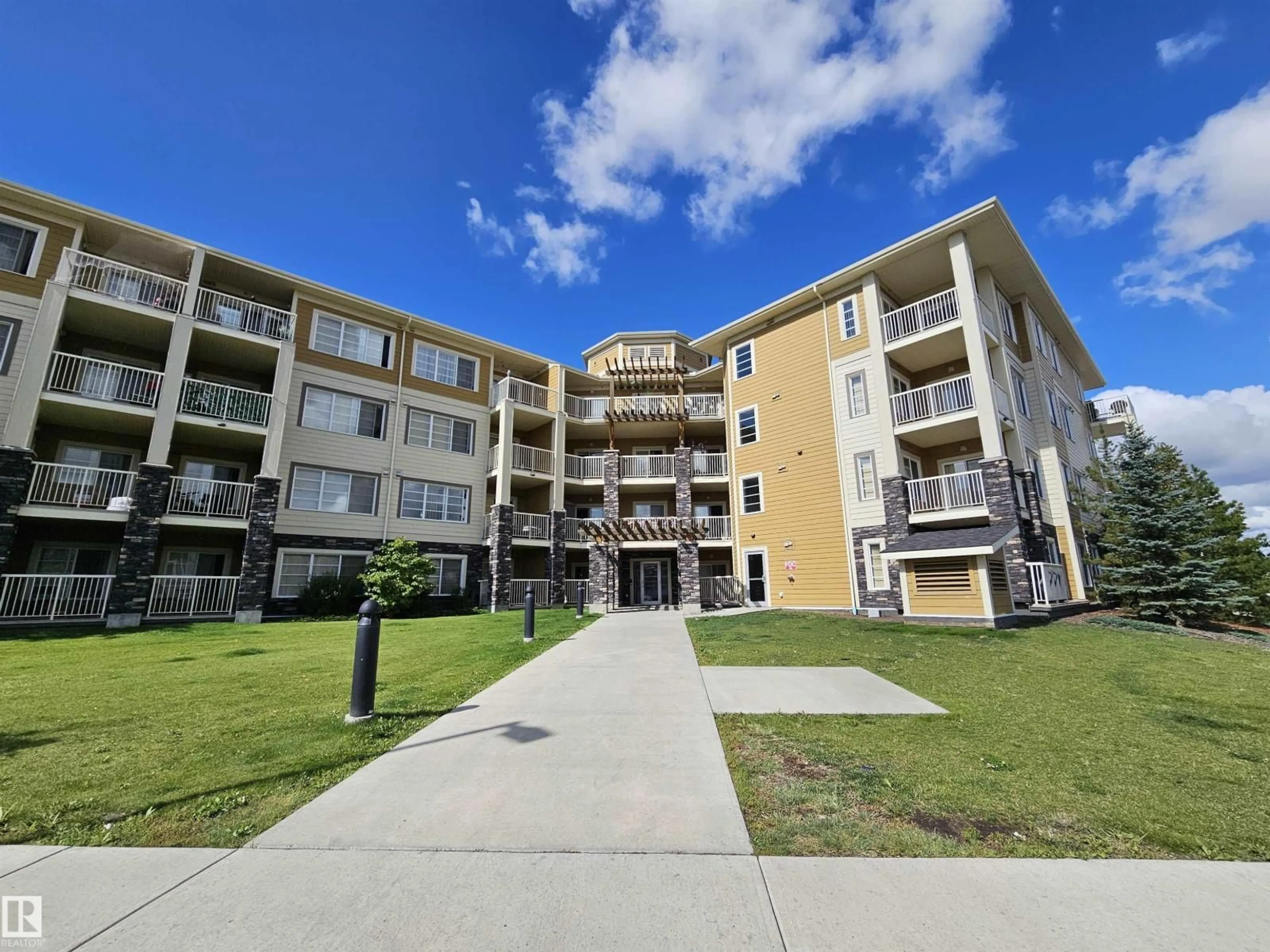 A pic from outside/outdoor area/front of a property/back of a property/a pic from drone, building for #205 - 3670 139 AV, Edmonton Alberta T5Y3N5